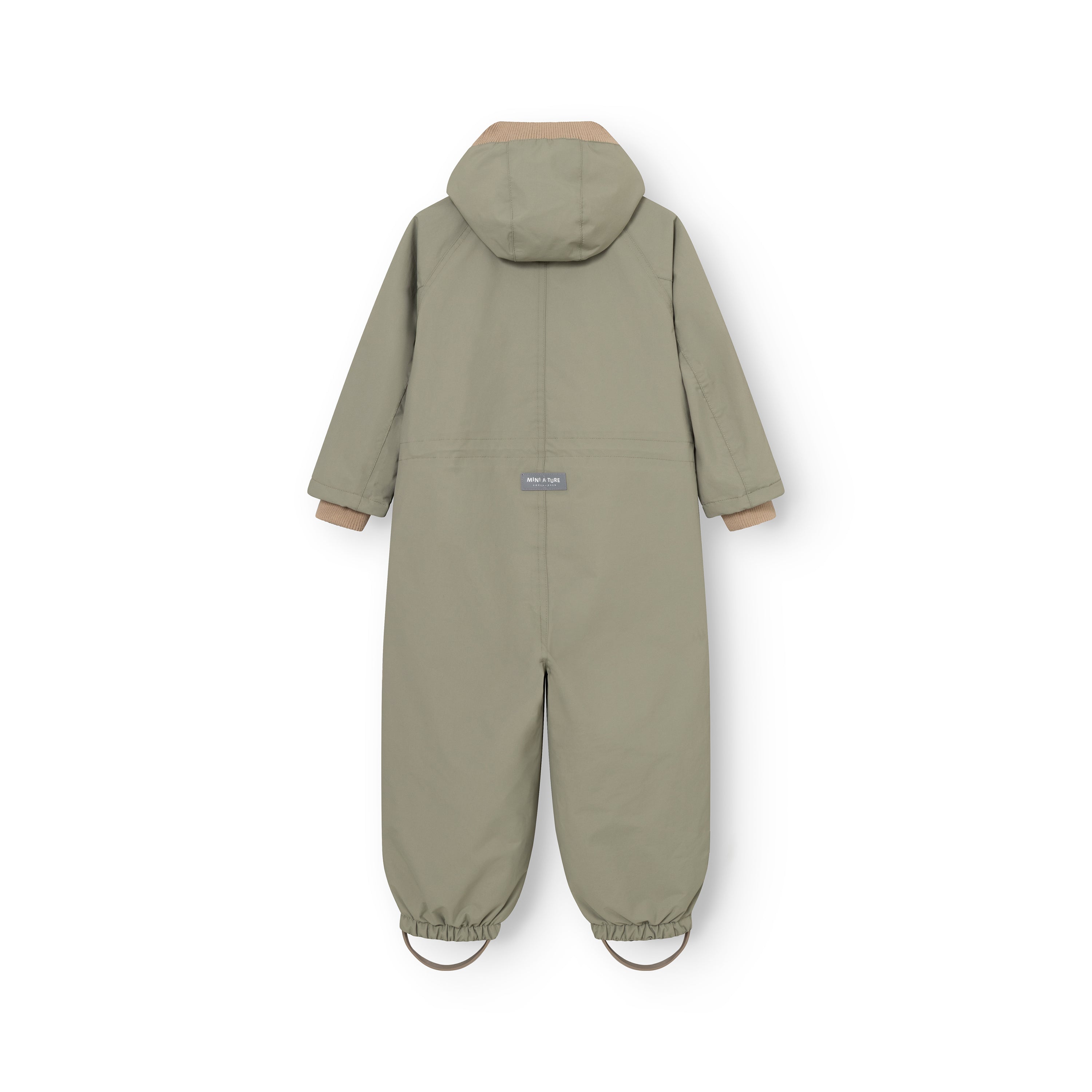 A green suit for children shown from the back, featuring tan ribbed cuffs and hem, elasticated ankle cuffs, and a small brand reflex label on the back.