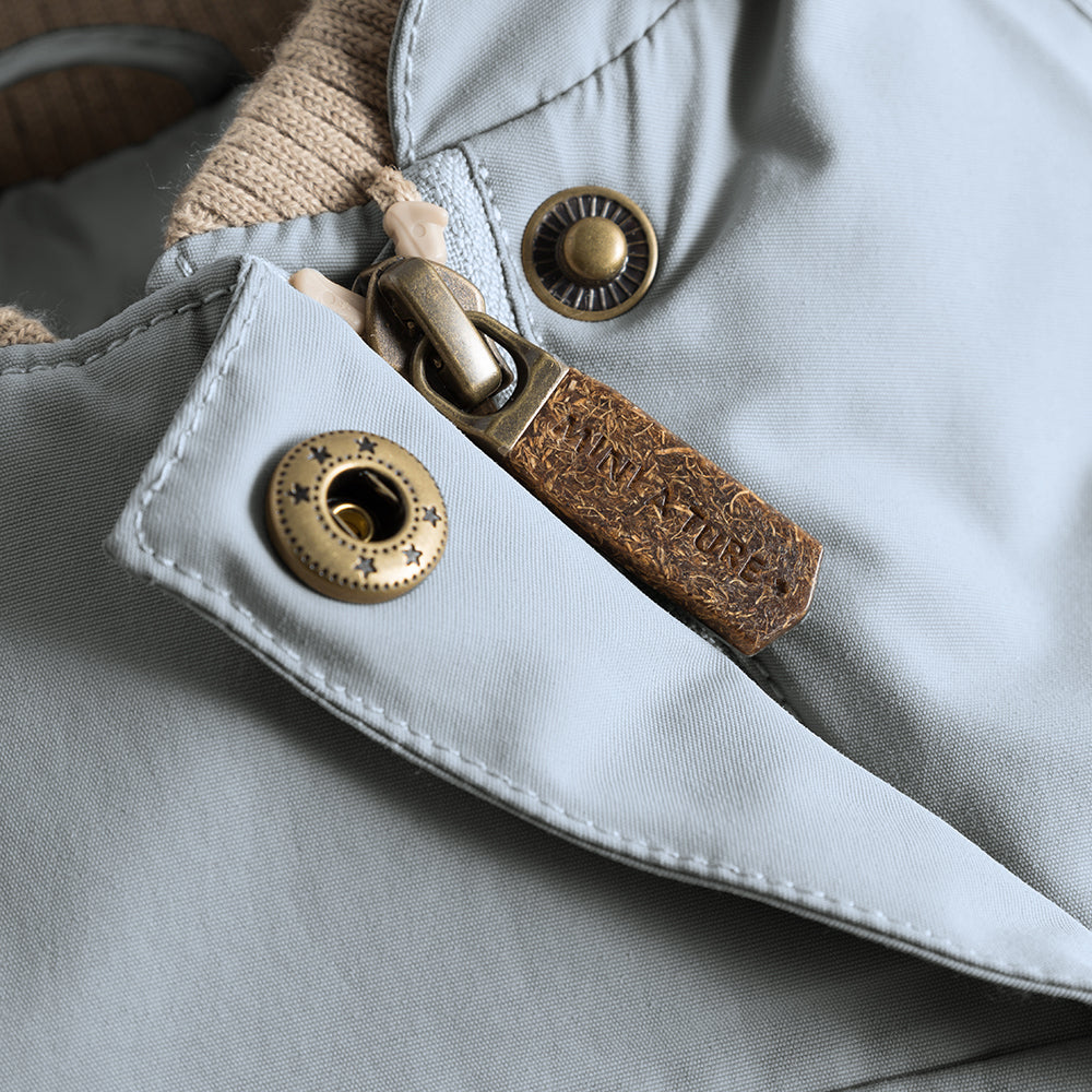 MATWANG Winterjacke mit Fleecefutter und Fellbesatz. GRS