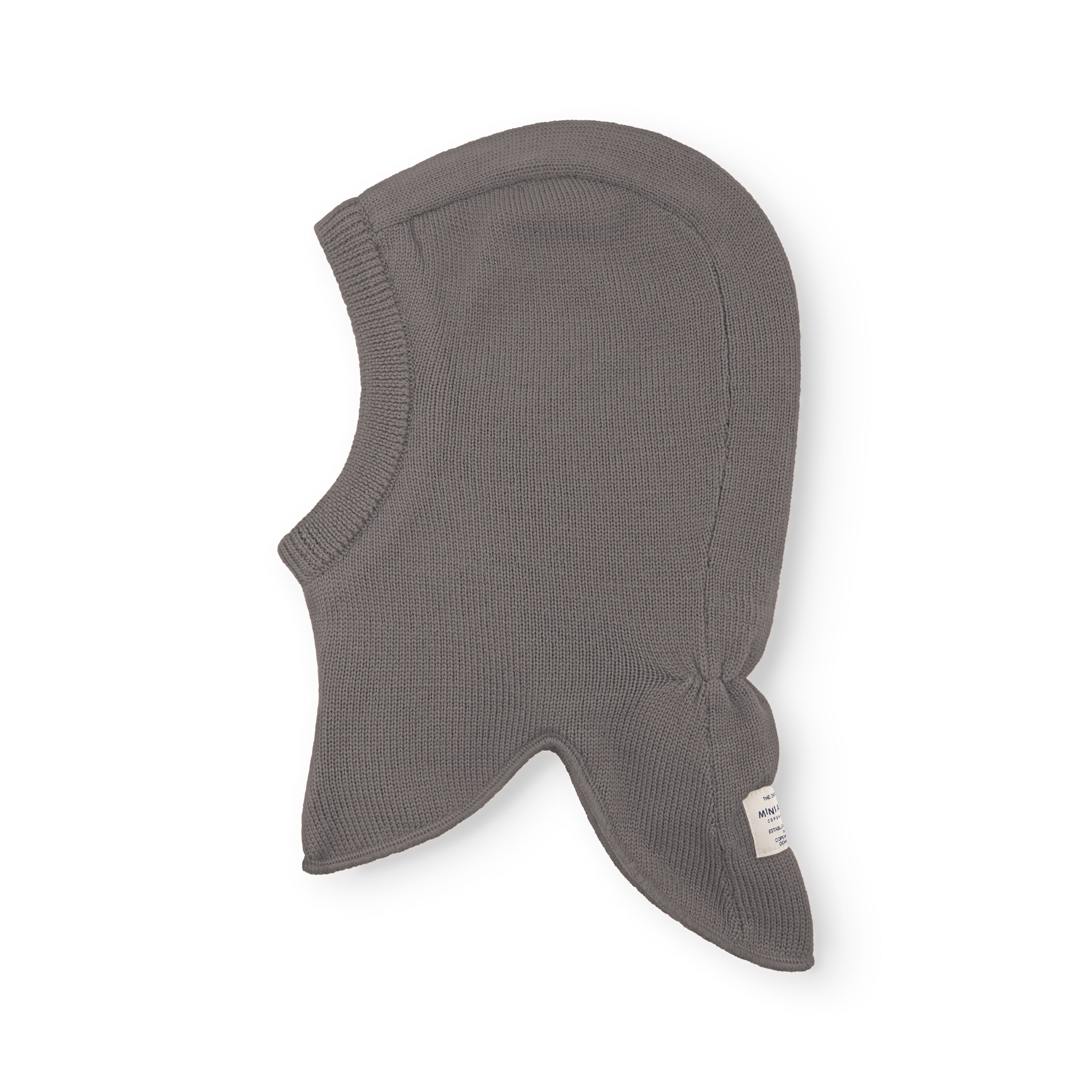 MATJORK balaclava in charcoal grey merino wool shown flat, displaying the full-coverage shape with integrated neck panel, face opening and windstoppers at the ear positions, with the MINI A TURE label visible at the lower back.