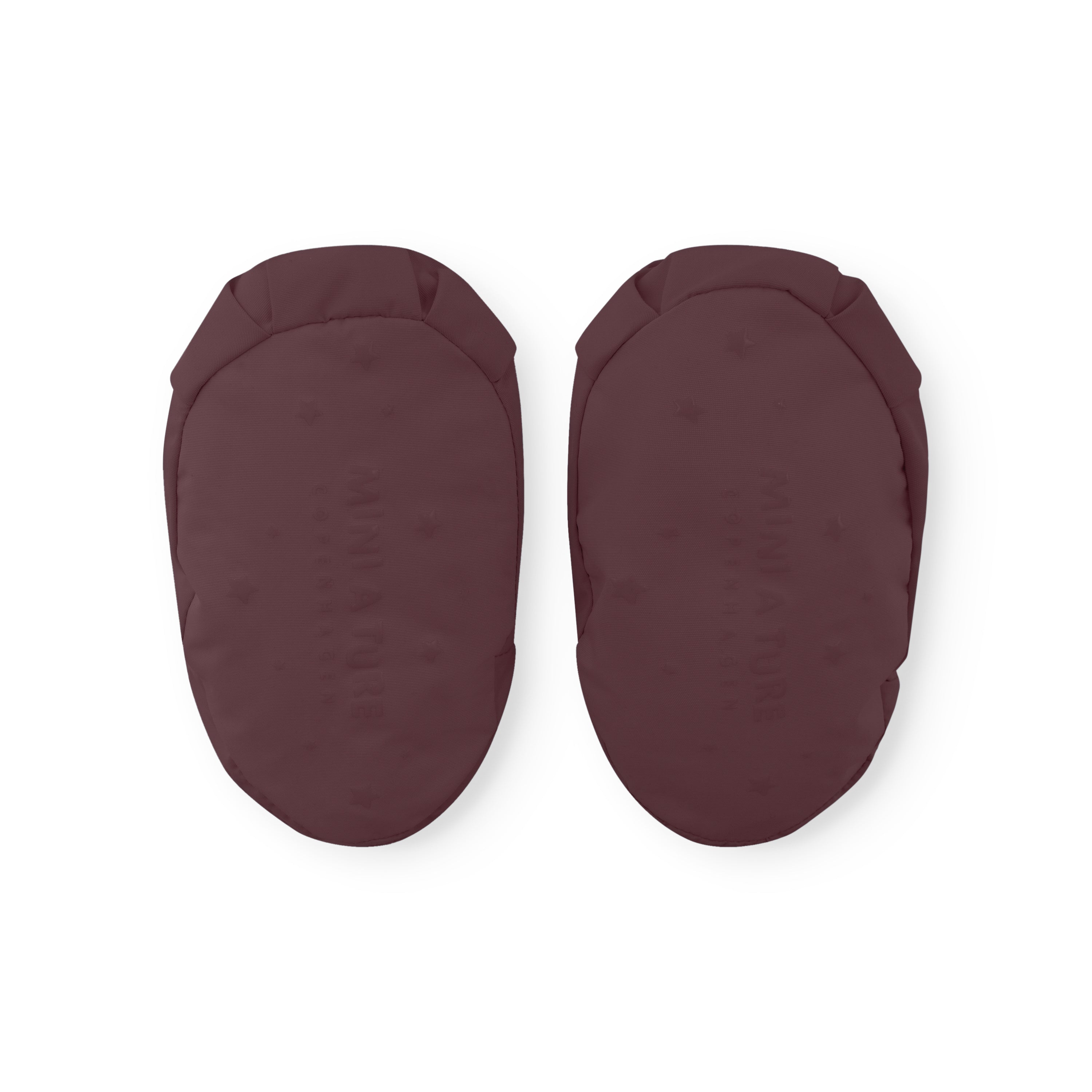 MATWINN insulated baby outdoor socks in plum brown photographed as a pair from the sole, showing the smooth waterproof recycled polyamide base and elasticated ankle opening for warmth during pram journeys.