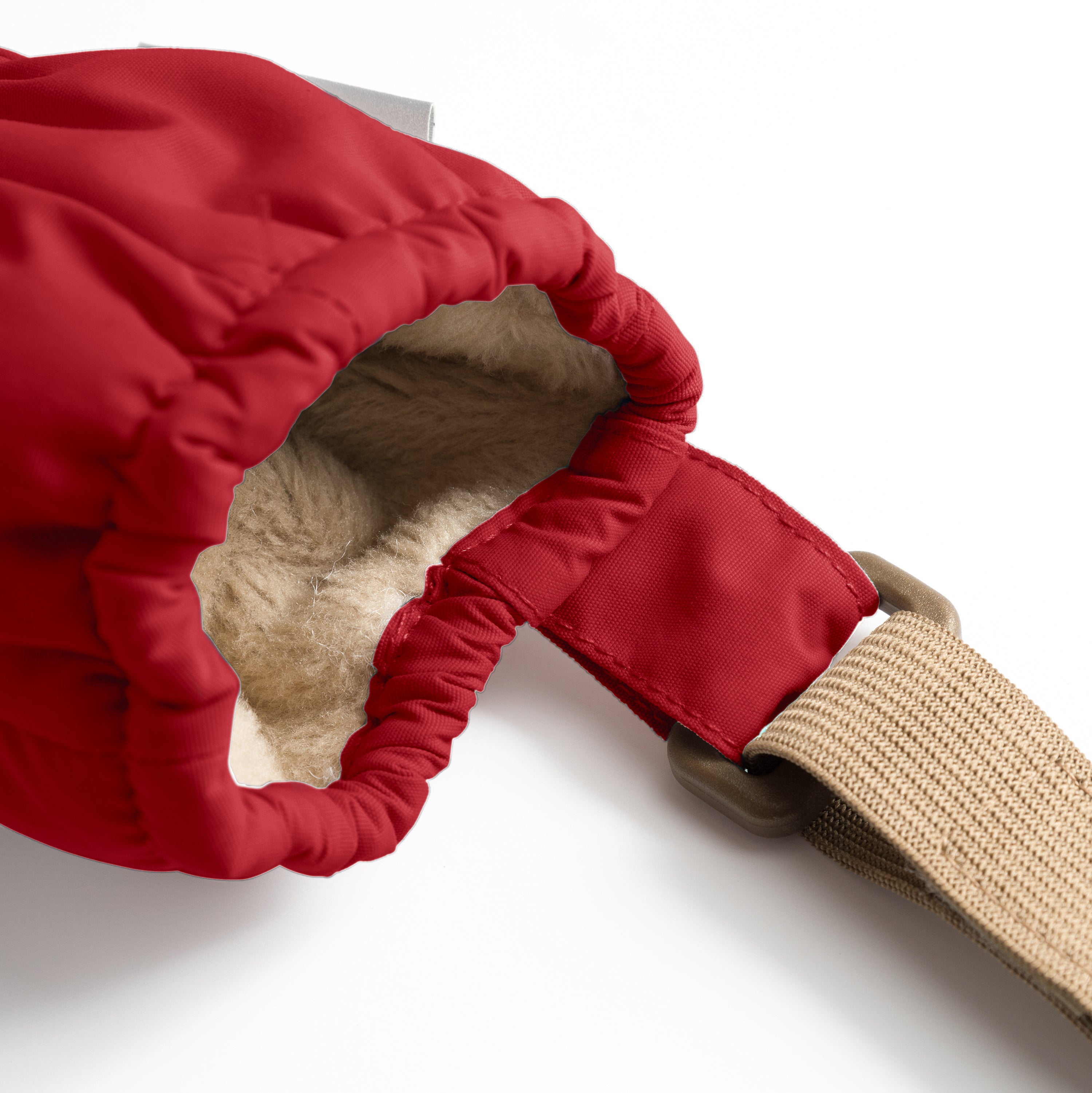 MATCORDT fleece lined mittens in red shown in close-up detail, revealing the THINSULATE padded construction, elastic gathered wrist opening and the contrast between the waterproof outer shell and soft fleece inner lining.
