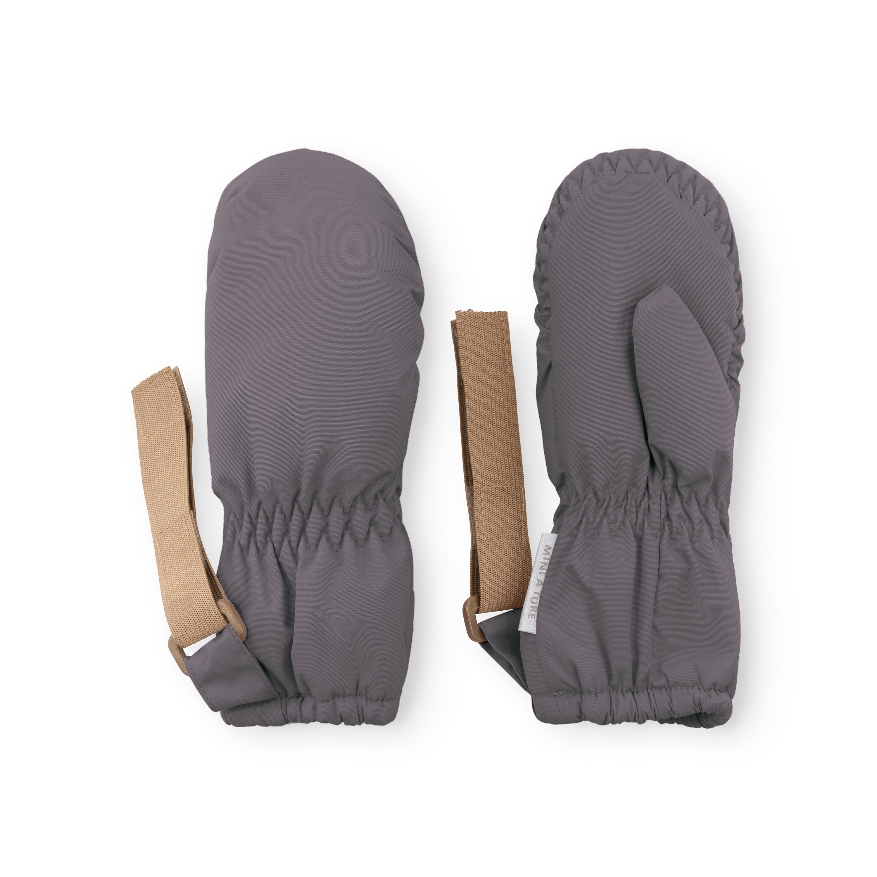MATCORDT fleece lined mittens in grey displayed flat showing front and back, with elastic gathered cuffs visible at the wrist and extended beige velcro attachment straps for securing to MINI A TURE jackets.