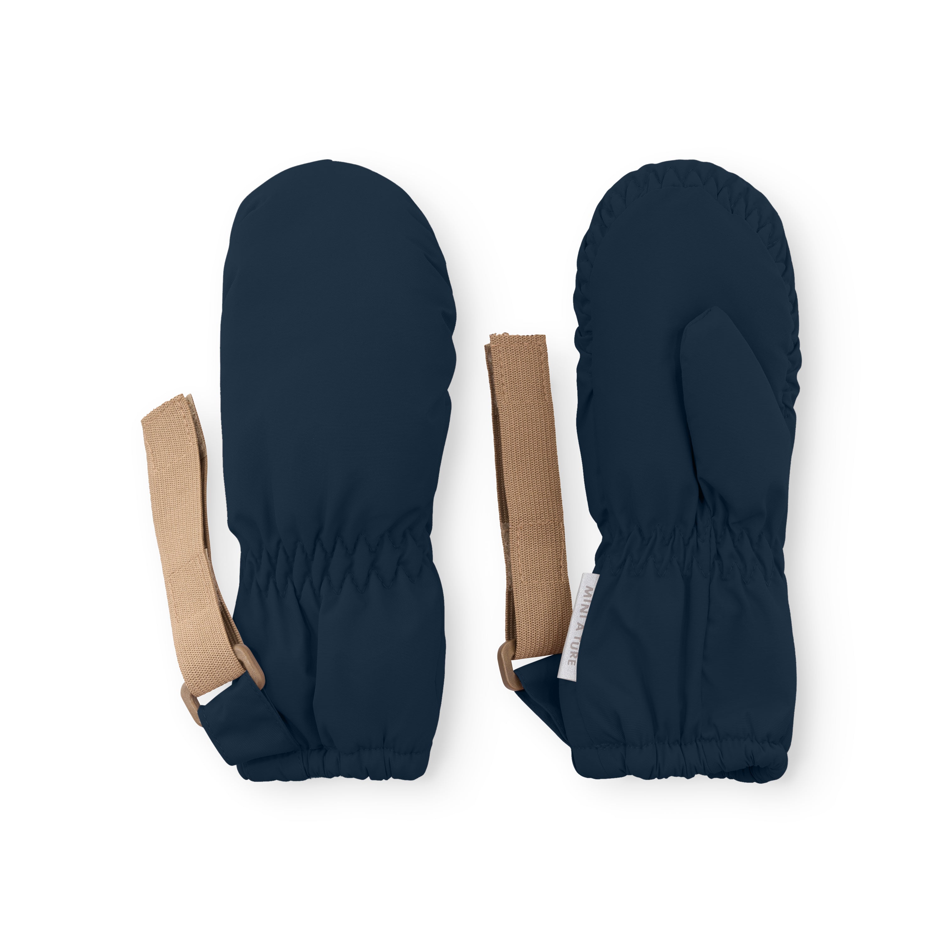 MATCORDT fleece lined mittens in navy blue displayed flat on a white background, with the elastic gathered cuffs and extended beige velcro attachment straps positioned outward to show the full length of the fastening system and the waterproof recycled polyamide outer shell from both sides.