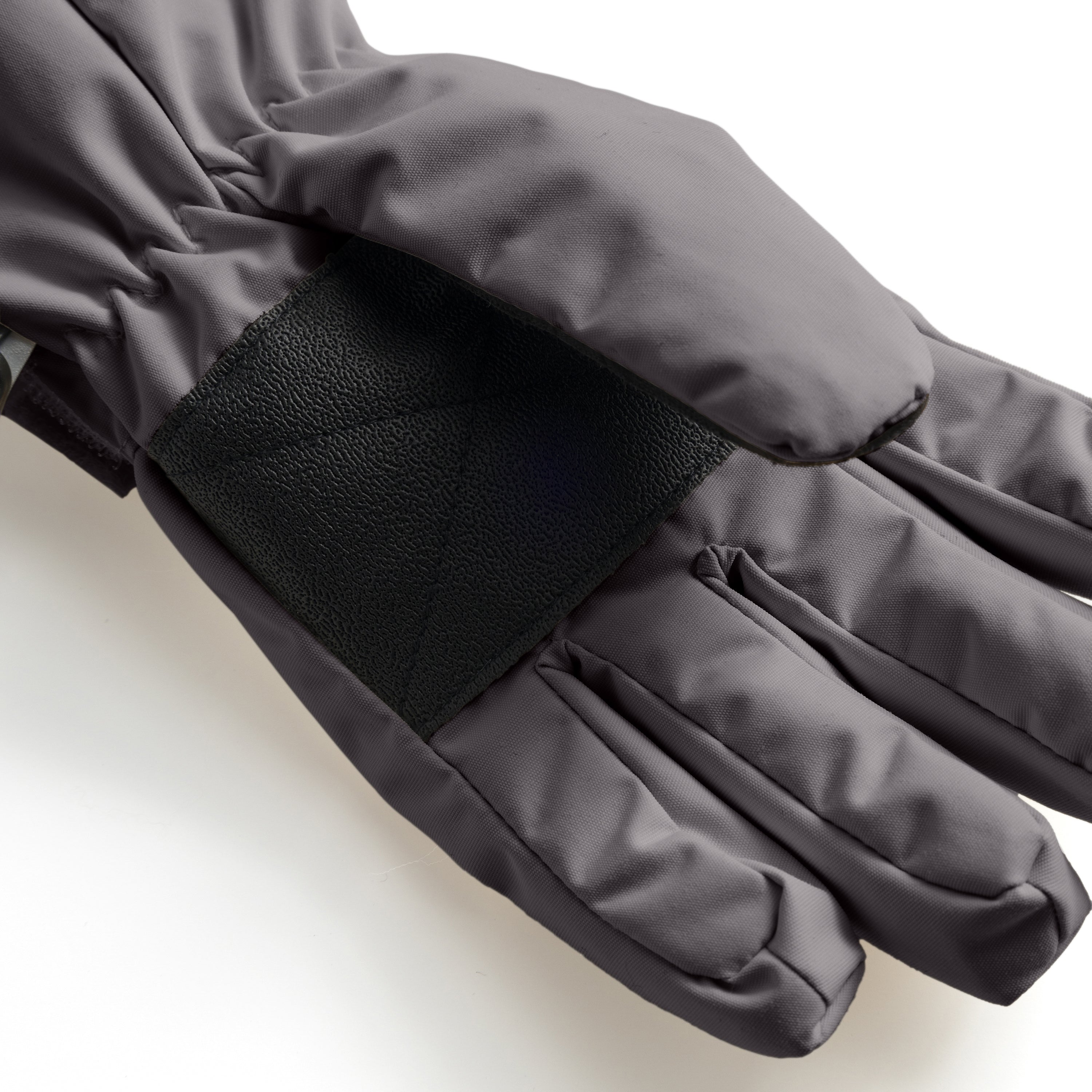 MATCELIO windproof kids gloves in grey showing the extended elasticated cuff and adjustable wrist strap with buckle closure, photographed in detail against a white background.