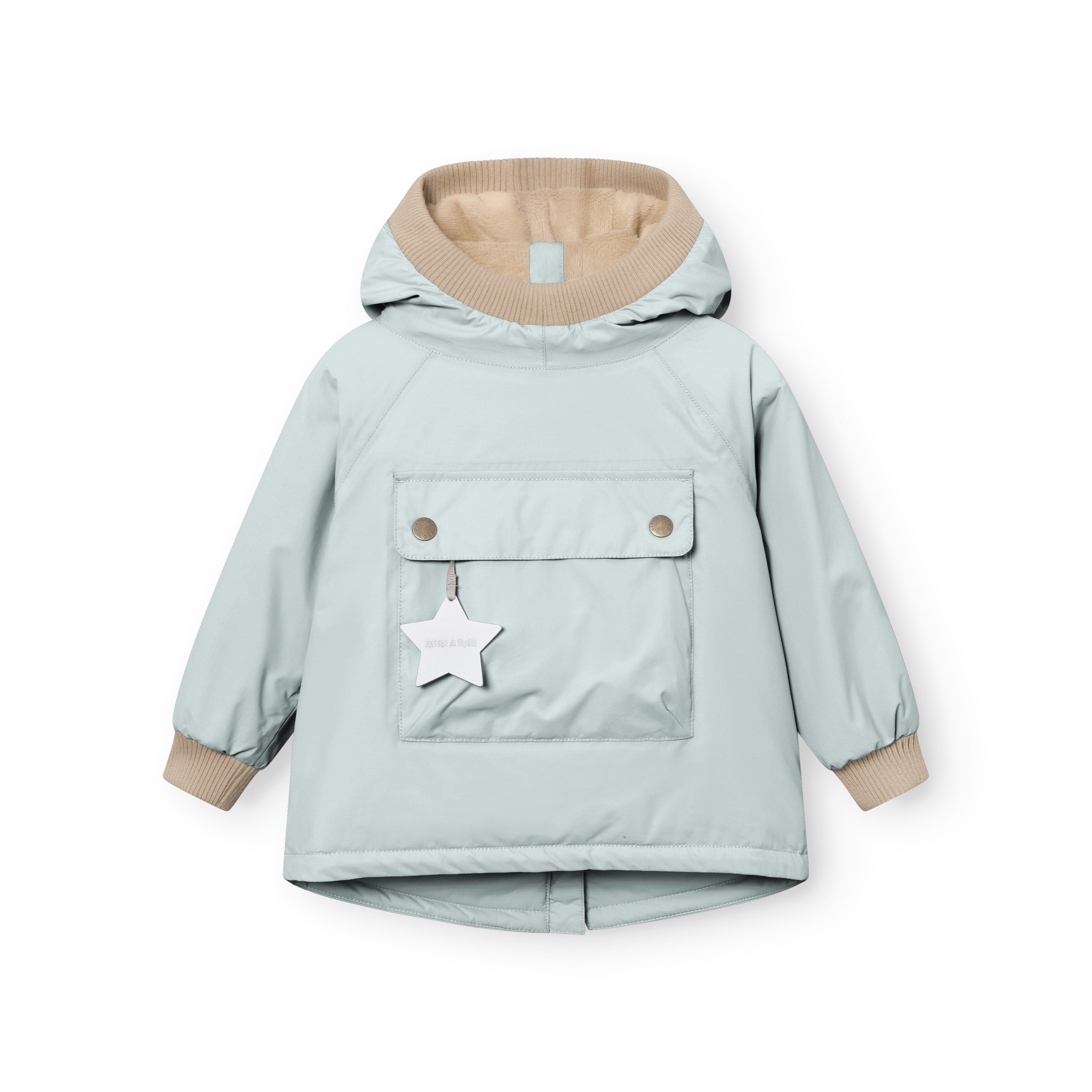 MATBABYWEN anorak in pale blue-grey laid flat from the front, showing the snap-button pocket with white reflective star tag, beige ribbed hood and cuffs, raglan sleeves, and the A-line hem with a small back vent.