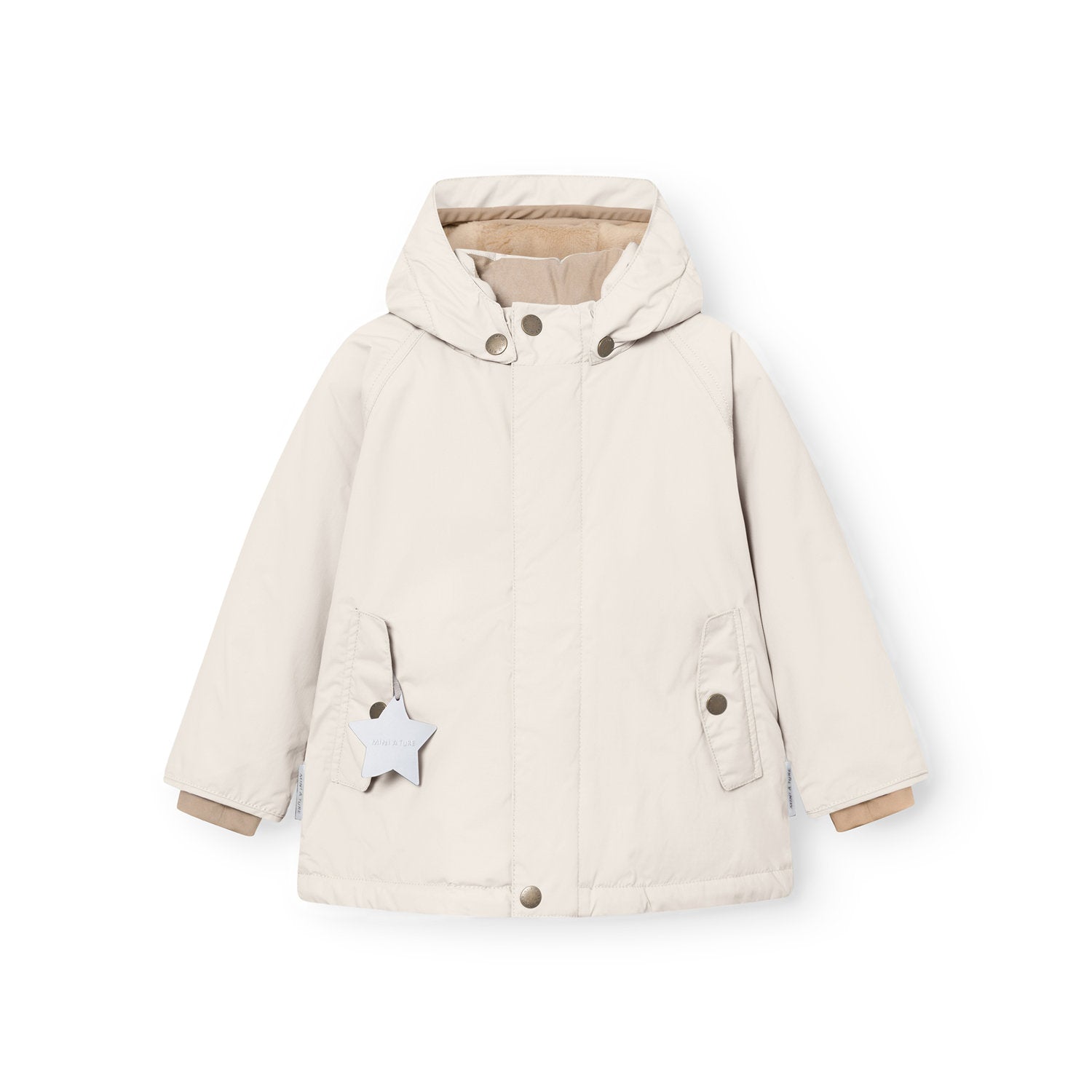MATWALLY fleece lined winter jacket in soft cream with detachable hood secured by metal snap buttons, concealed centre-front zip, angled front pockets with snap closures, beige fleece lining visible at the collar and cuffs, and a white reflective star hanging from the left pocket.