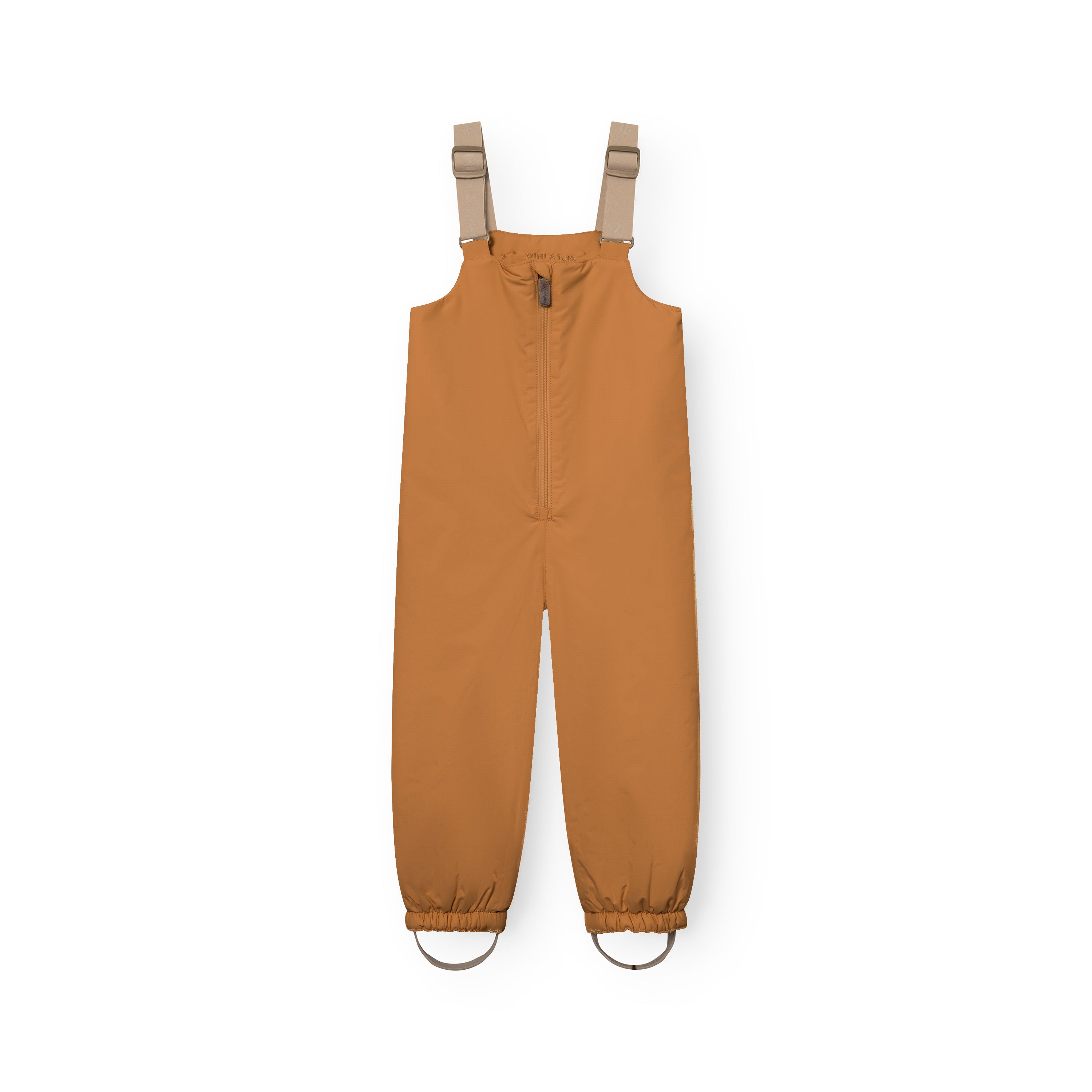 MATWALENTEX snow pants laid flat in caramel, displaying the waterproof recycled polyamide shell, beige adjustable suspenders, full-length front zip and elasticated ankle cuffs with removable foot straps.