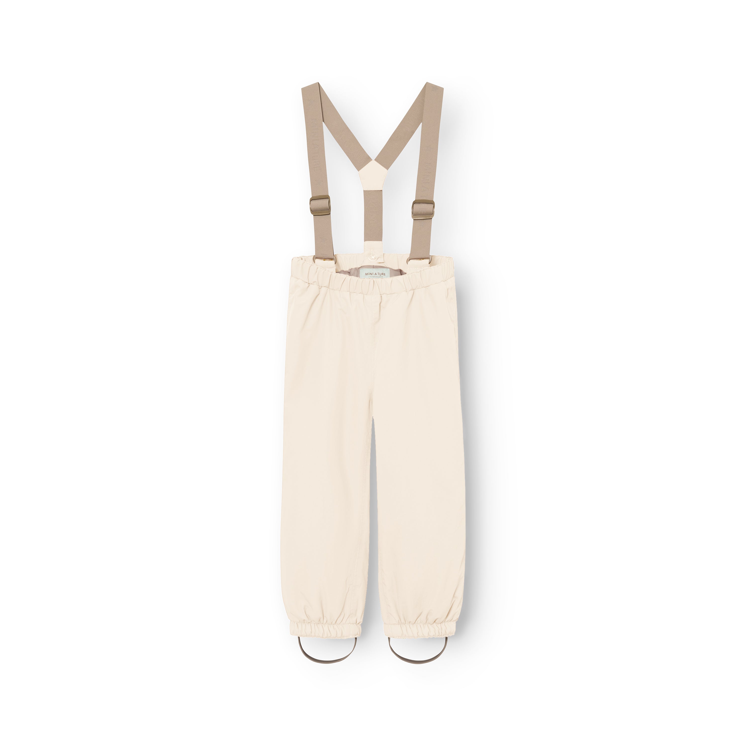 MATWILAS snow pants in cream with beige adjustable cross-back braces and elasticated ankle cuffs featuring removable foot straps, laid flat on a white background.
