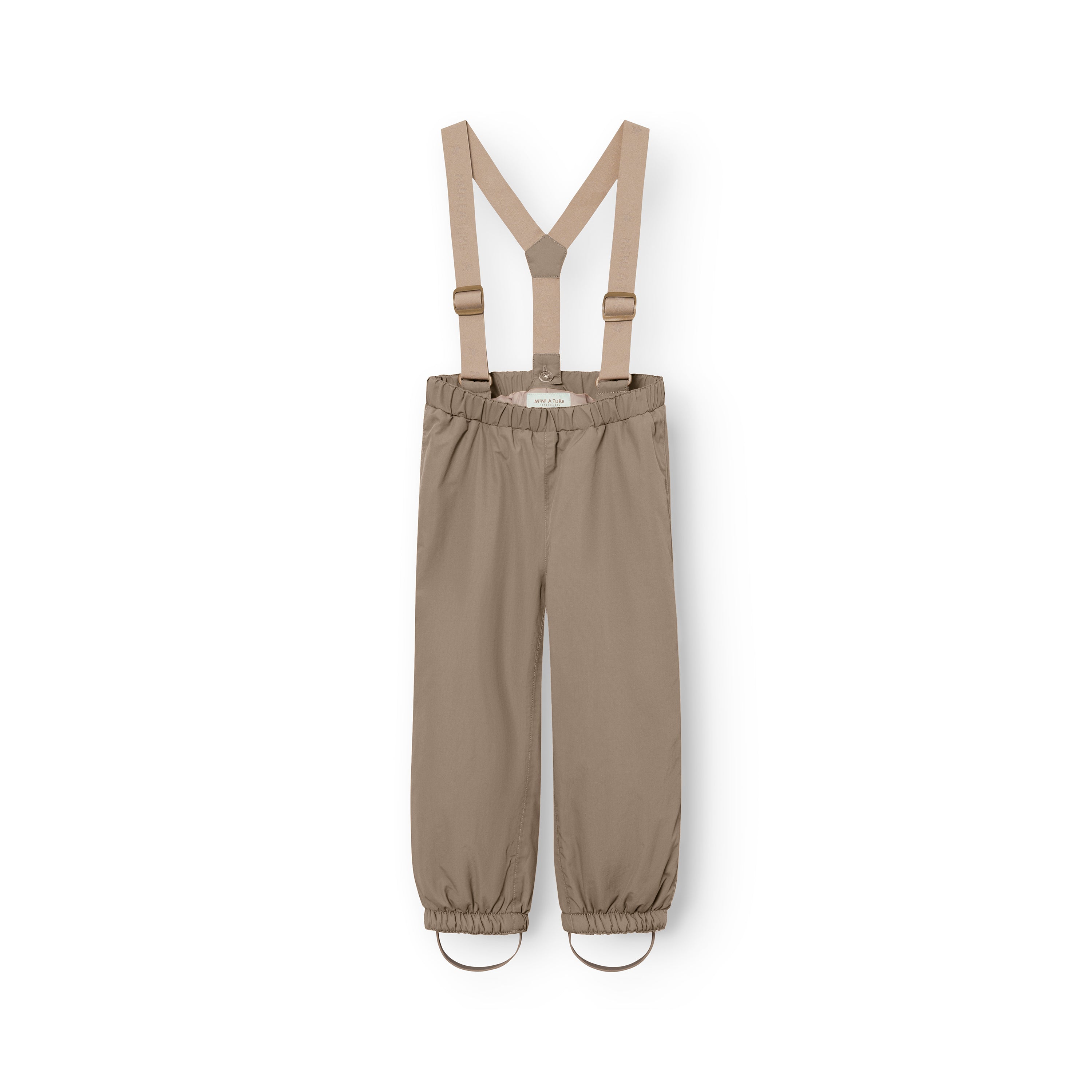 MATWILAS snow pants in warm taupe with adjustable cross-back braces, elasticated waistband and ankle cuffs with removable foot straps, shown flat on a white background.