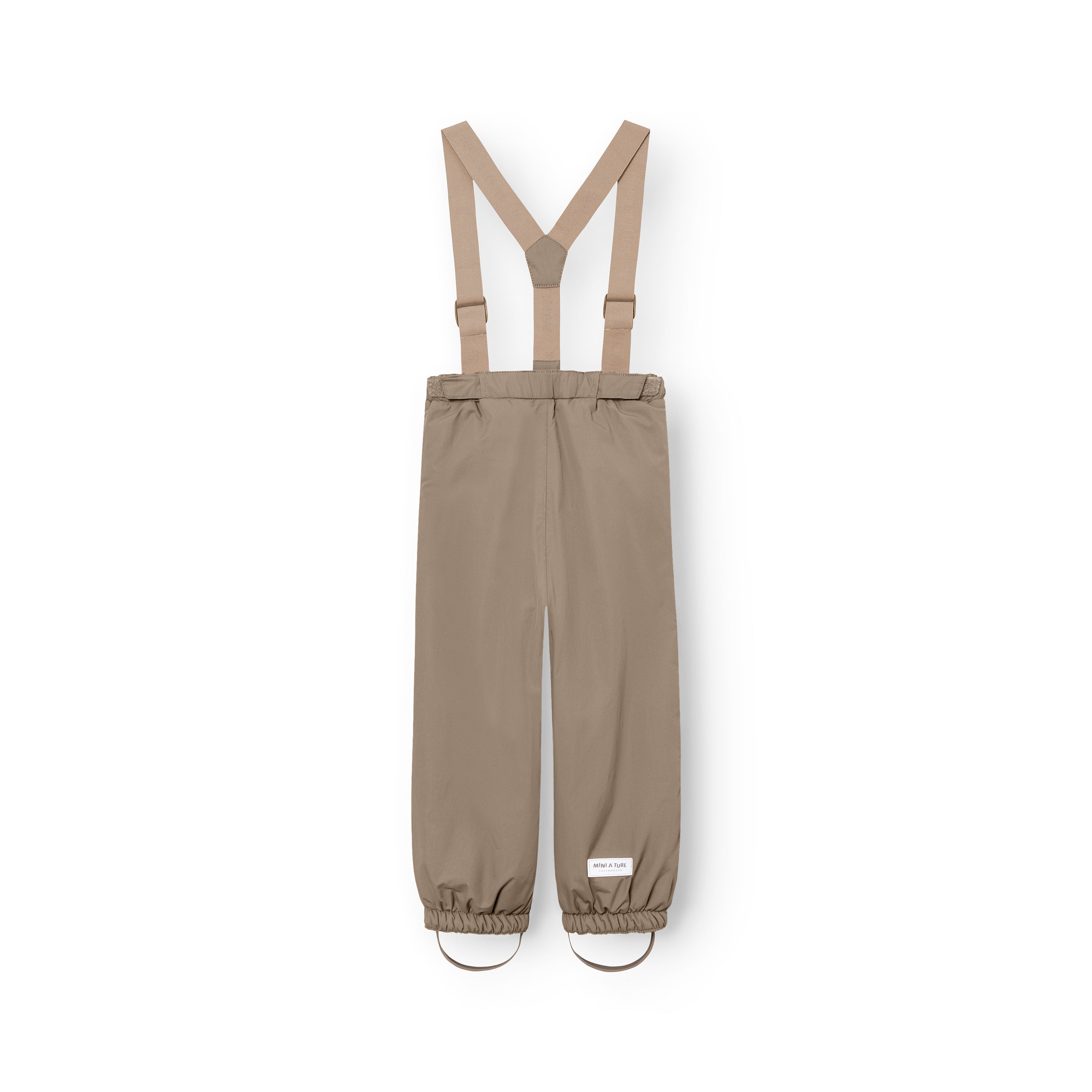 MATWILAS snow pants in warm taupe with beige adjustable braces, elasticated ankle cuffs and removable foot straps, photographed flat from the back on a white background.