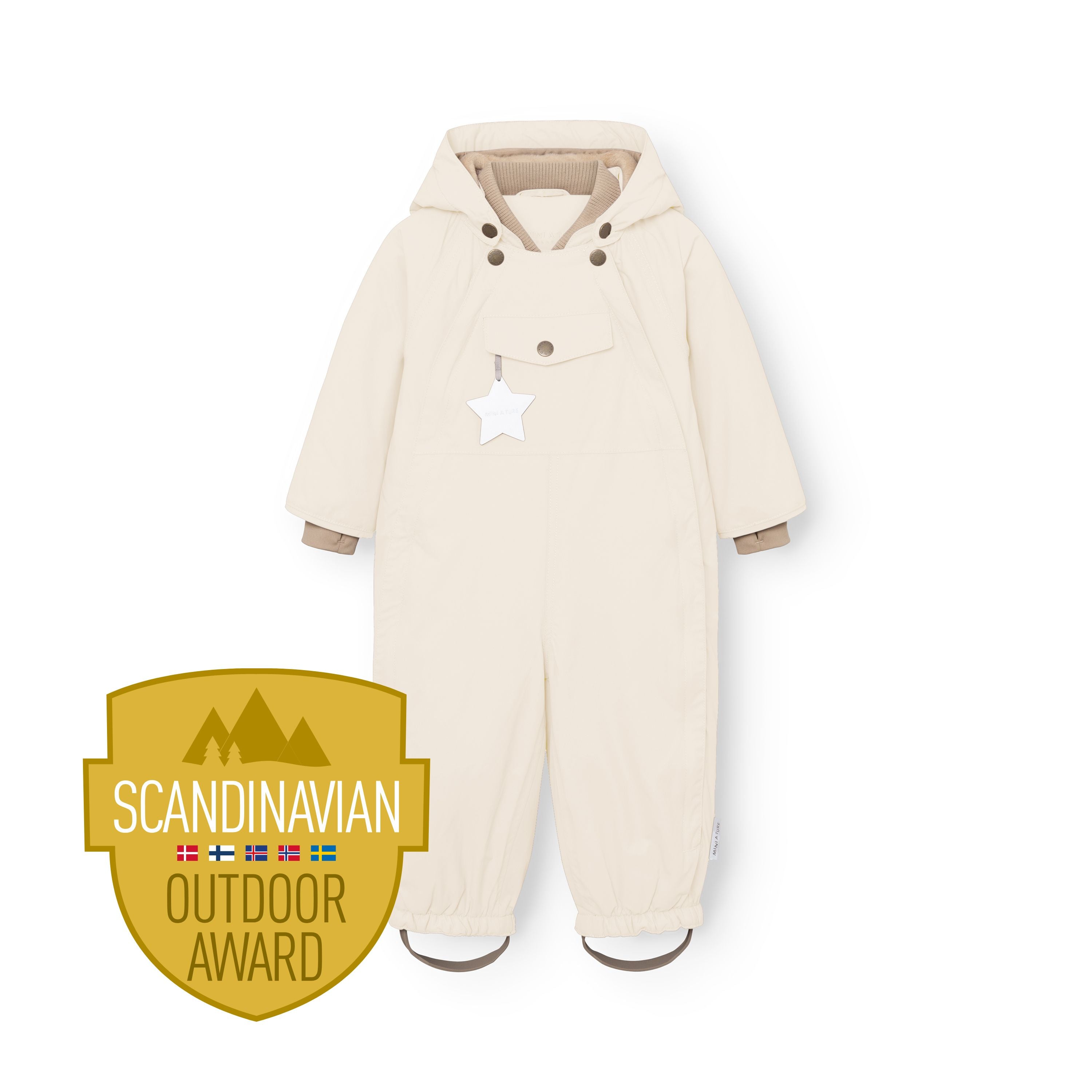 MATWISTI fleece lined snowsuit in warm beige displayed front-facing against a white background, featuring a detachable hood with snap buttons, front chest pocket with white reflective star, beige ribbed cuffs at the wrists, elasticated leg openings with adjustable foot straps, and the Scandinavian Outdoor Award badge positioned at the lower left.