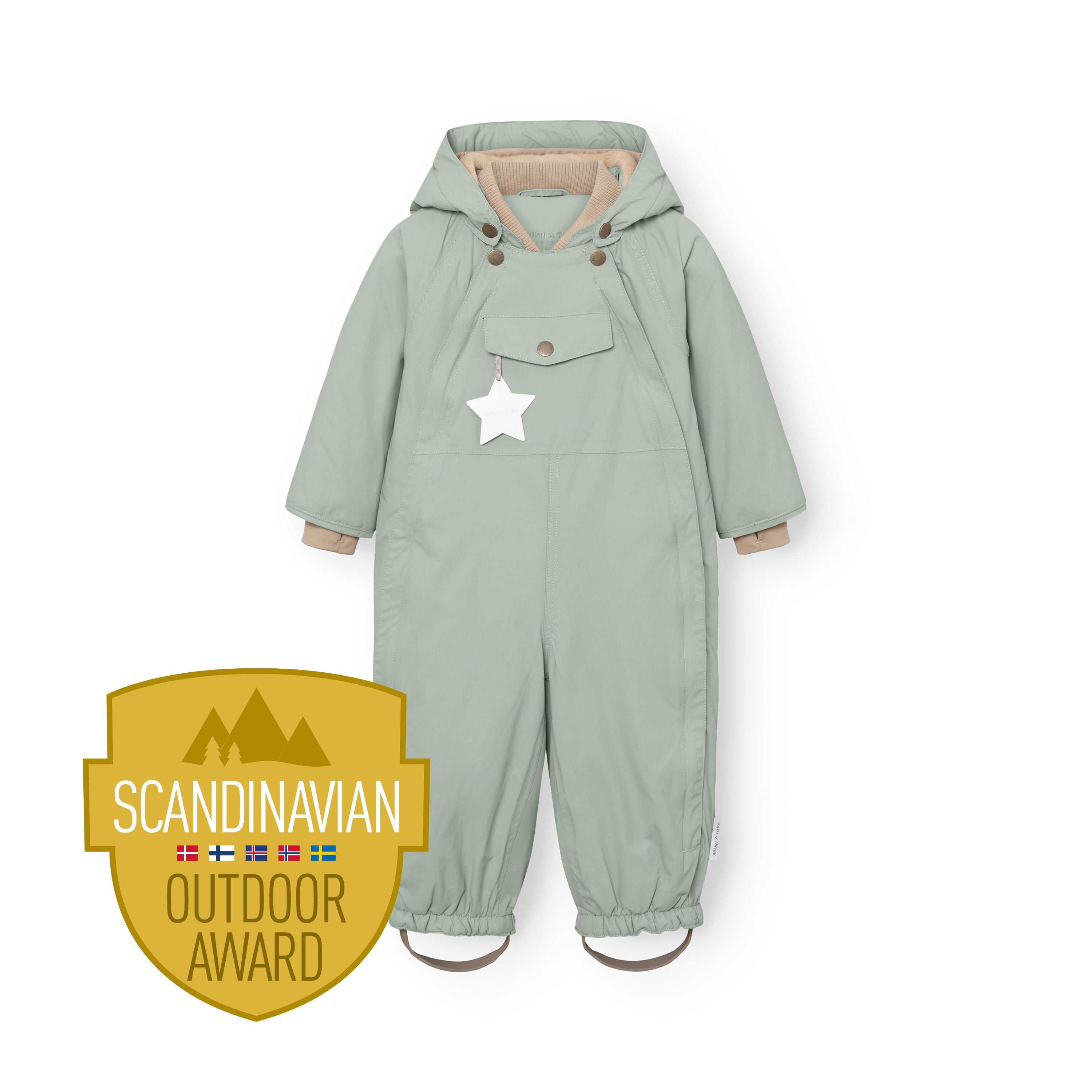MATWISTI fleece lined snowsuit in soft sage green with a detachable hood, reflective star detail on the chest pocket and adjustable foot straps, displayed flat with a Scandinavian Outdoor Award badge.