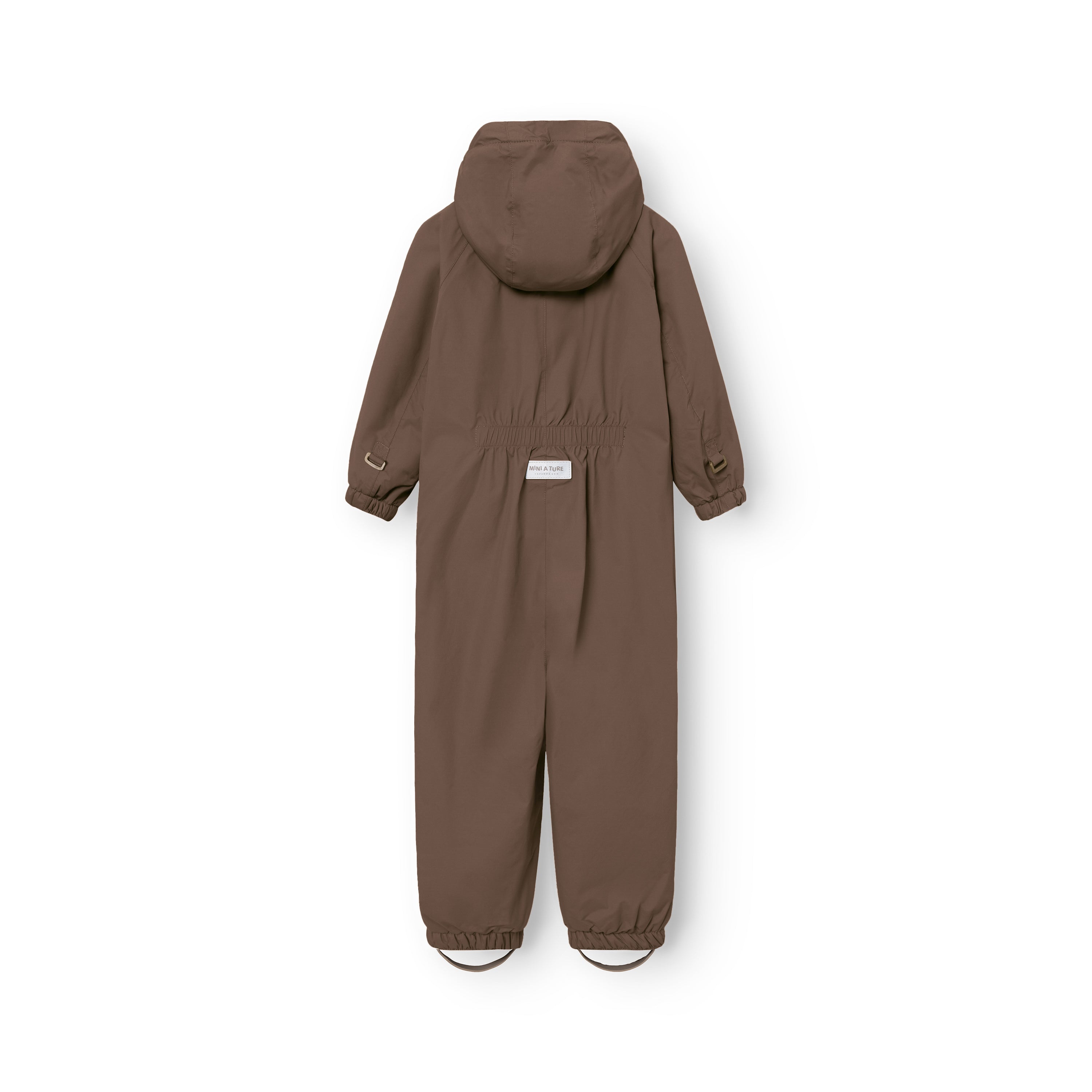 MATWILBO snowsuit viewed from the back in warm brown, showing the detachable hood, elasticated back waist, D-loops at the cuffs and removable foot straps with a MINI A TURE label at the lower back.
