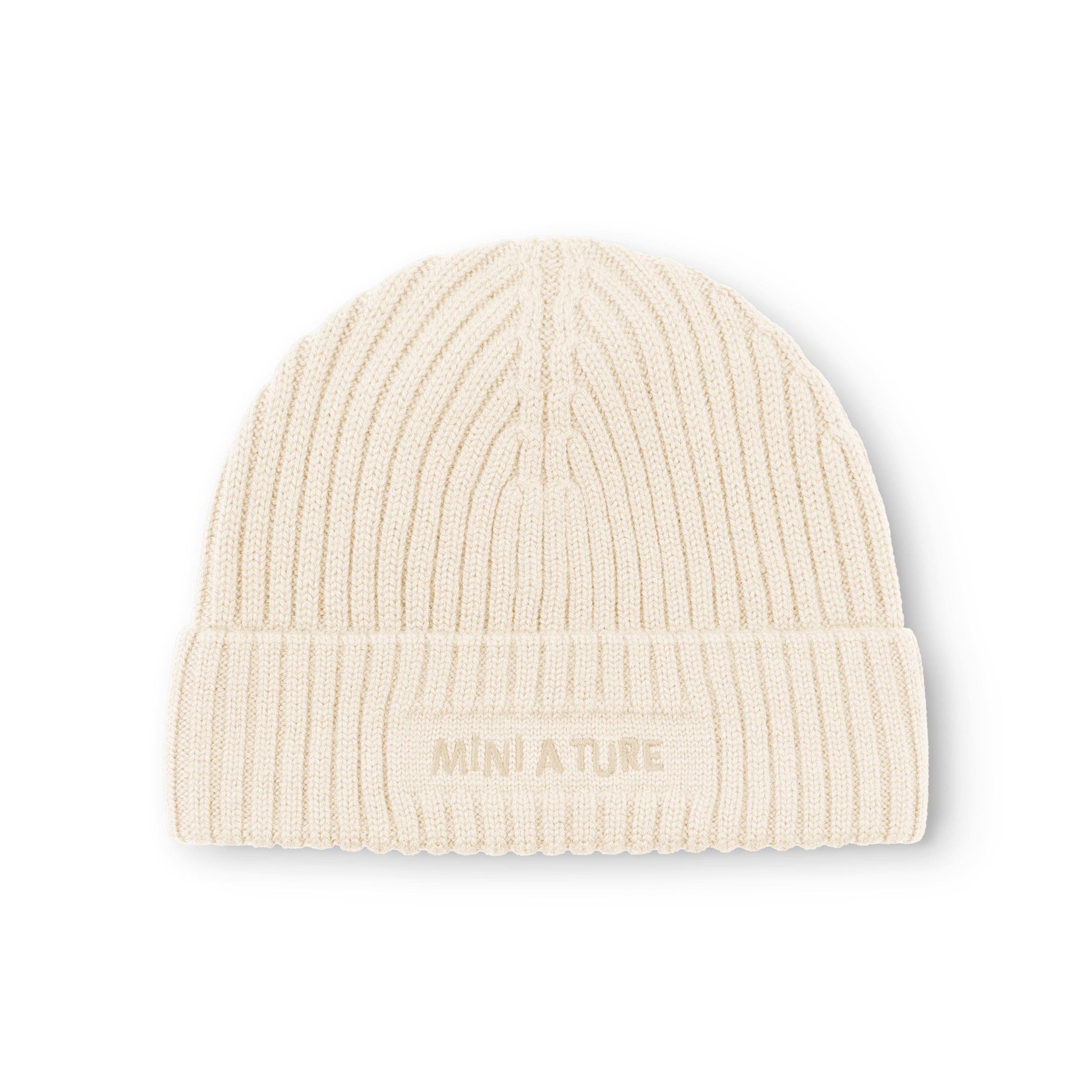 MATBOJE fleece lined beanie in cream merino wool with fold-up brim in place, showing the embroidered MINI A TURE logo and the ribbed knit pattern across the crown.