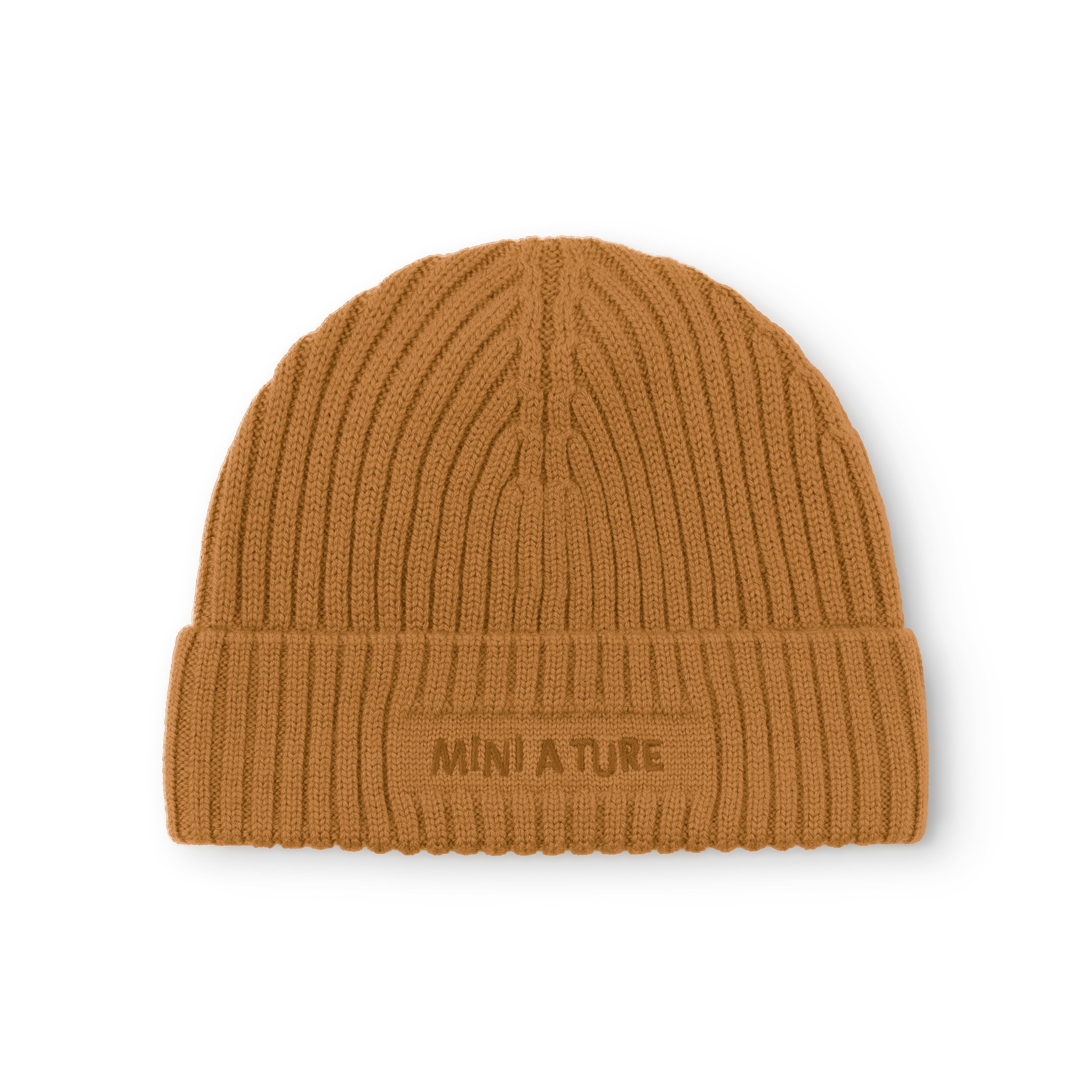 MATBOJE fleece lined beanie in warm caramel merino wool with fold-up brim worn down, showing the embroidered MINI A TURE logo and ribbed knit texture across the front.