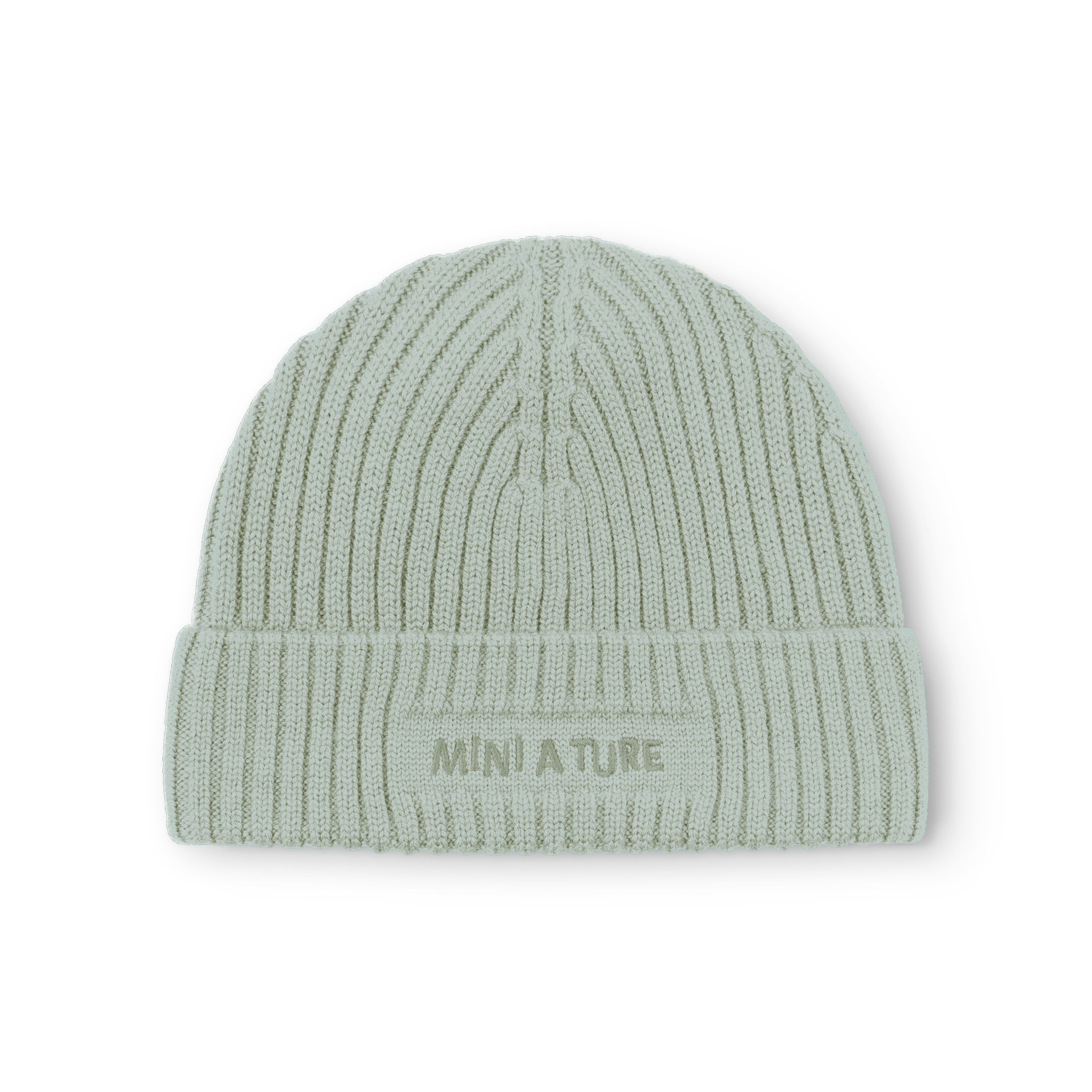 MATBOJE fleece lined beanie in pale mint green merino wool with fold-up brim in place, showing the embroidered MINI A TURE logo and the ribbed knit texture across the crown and brim.