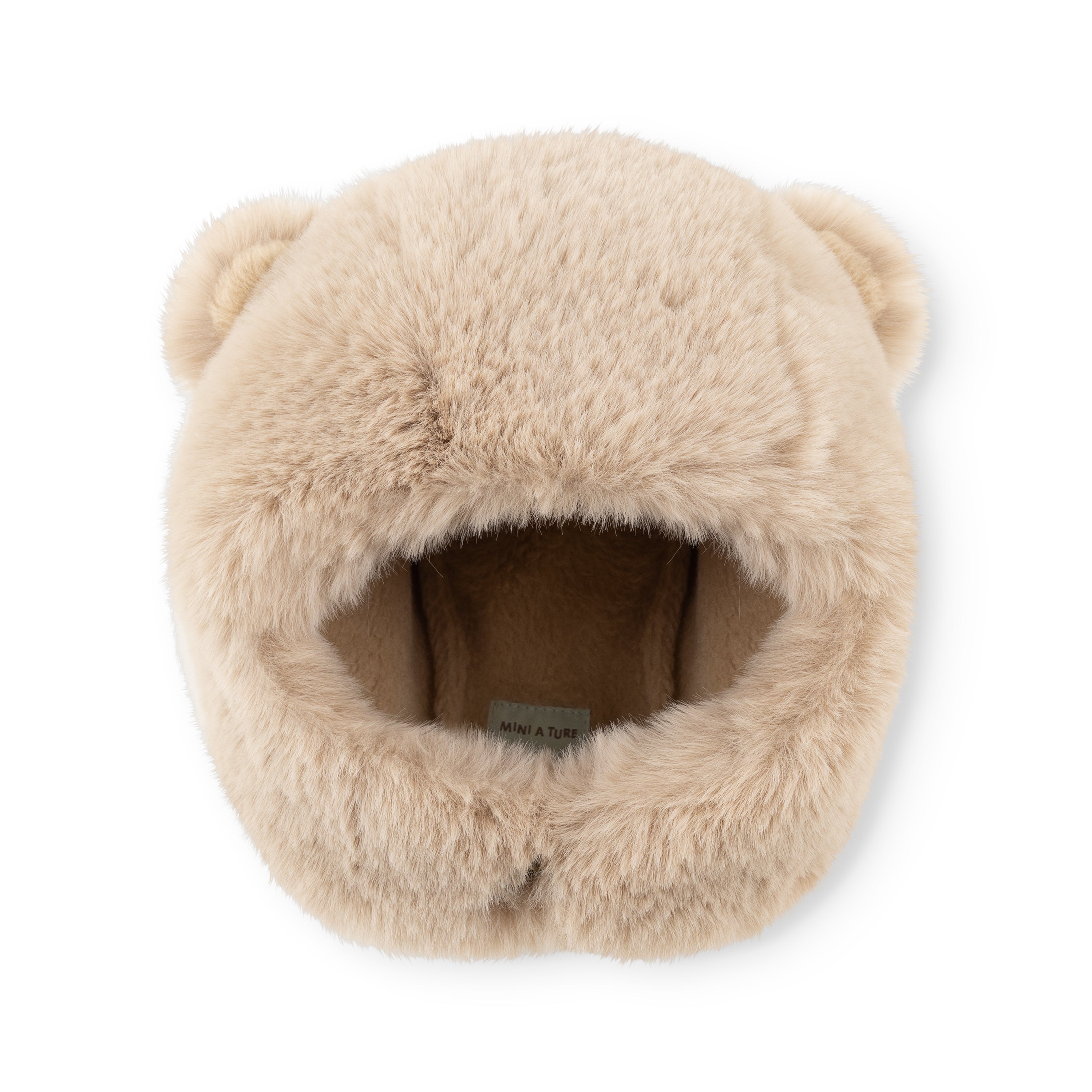 MATLIEN bear fleece lined winter hood in cream with rounded bear ears, shown flat from above to display the fluffy recycled polyester outer and soft inner lining with MINI A TURE label.