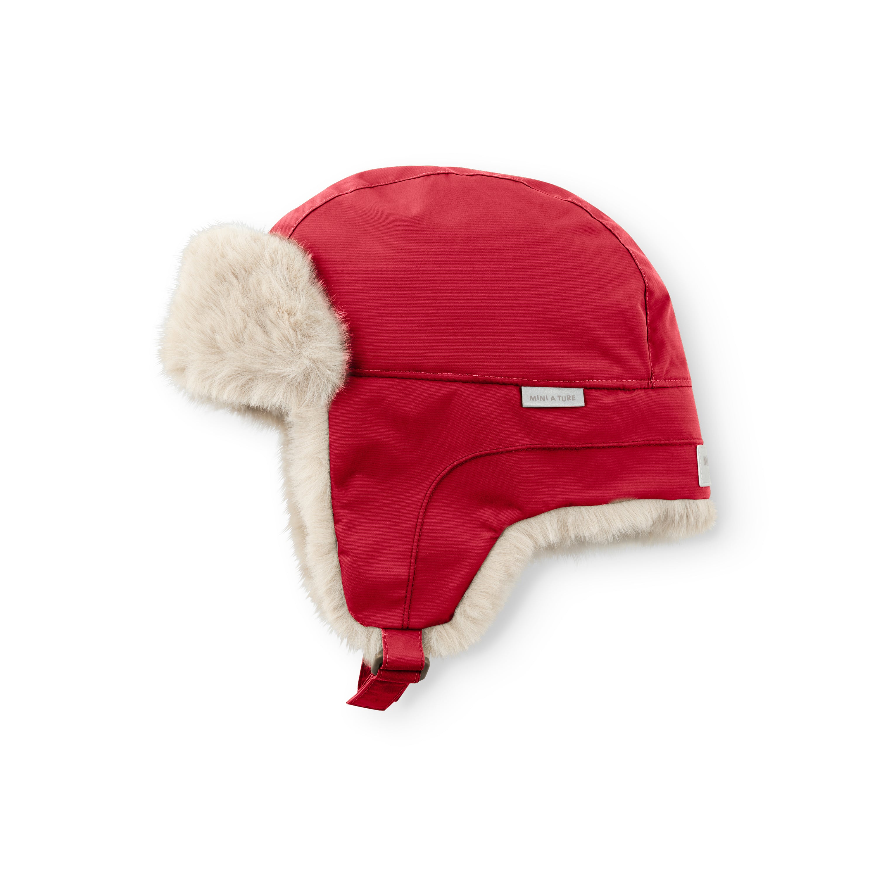 MATCRISTER children's winter hood in bright red with cream faux fur ear flaps and lining, displayed at an angle showing the waterproof nylon shell, velcro chin strap and reflective MINI A TURE label.