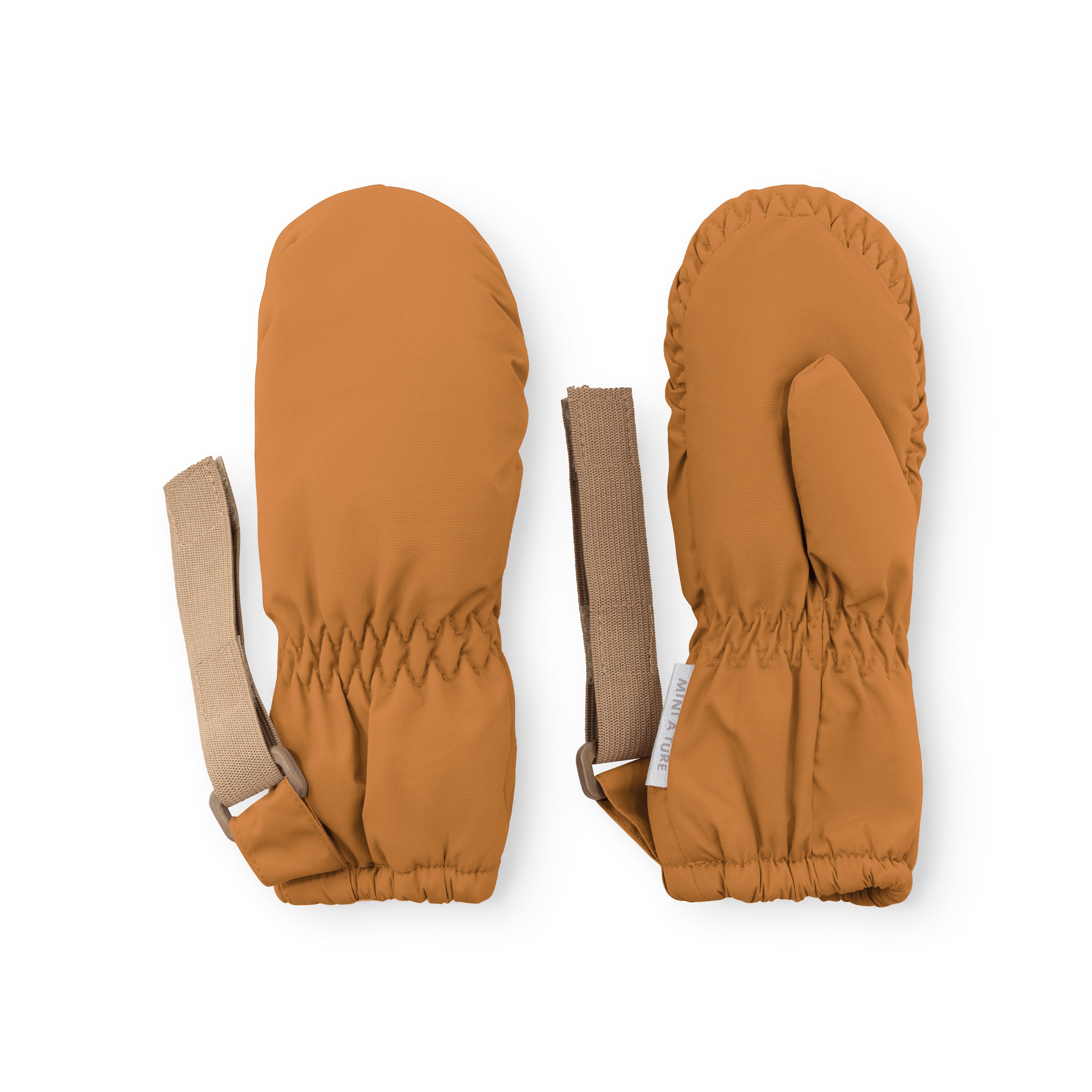 MATCORDT fleece lined mittens in caramel brown displayed flat on a white background, showing the front and back with elastic gathered cuffs at the wrist, beige velcro attachment straps and the waterproof recycled polyamide outer shell.