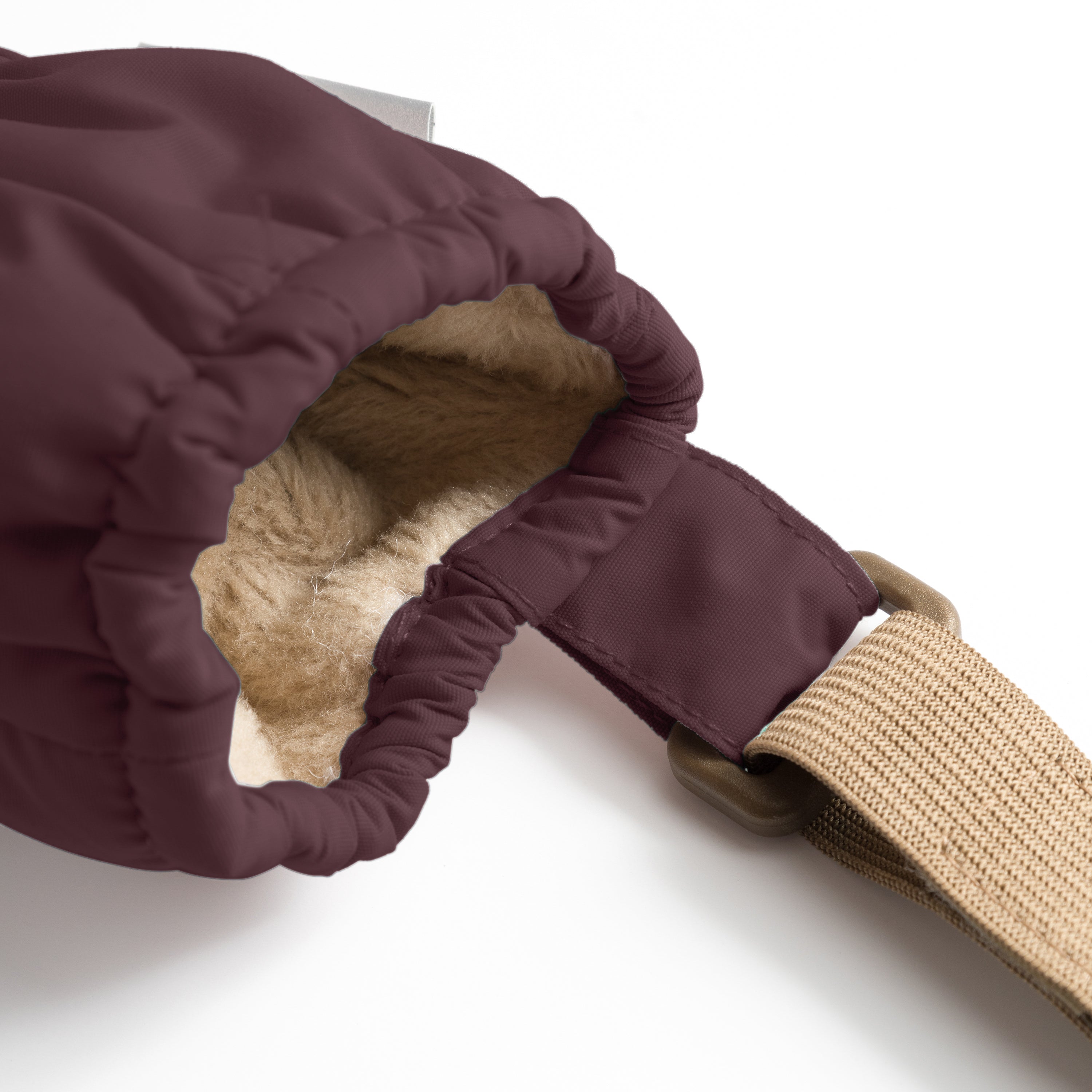 MATCORDT fleece lined mittens in deep plum shown from the interior with the cuff turned back, exposing the soft beige fleece lining, THINSULATE padding layer and elastic gathered wrist construction that seals out cold air and moisture during outdoor play.
