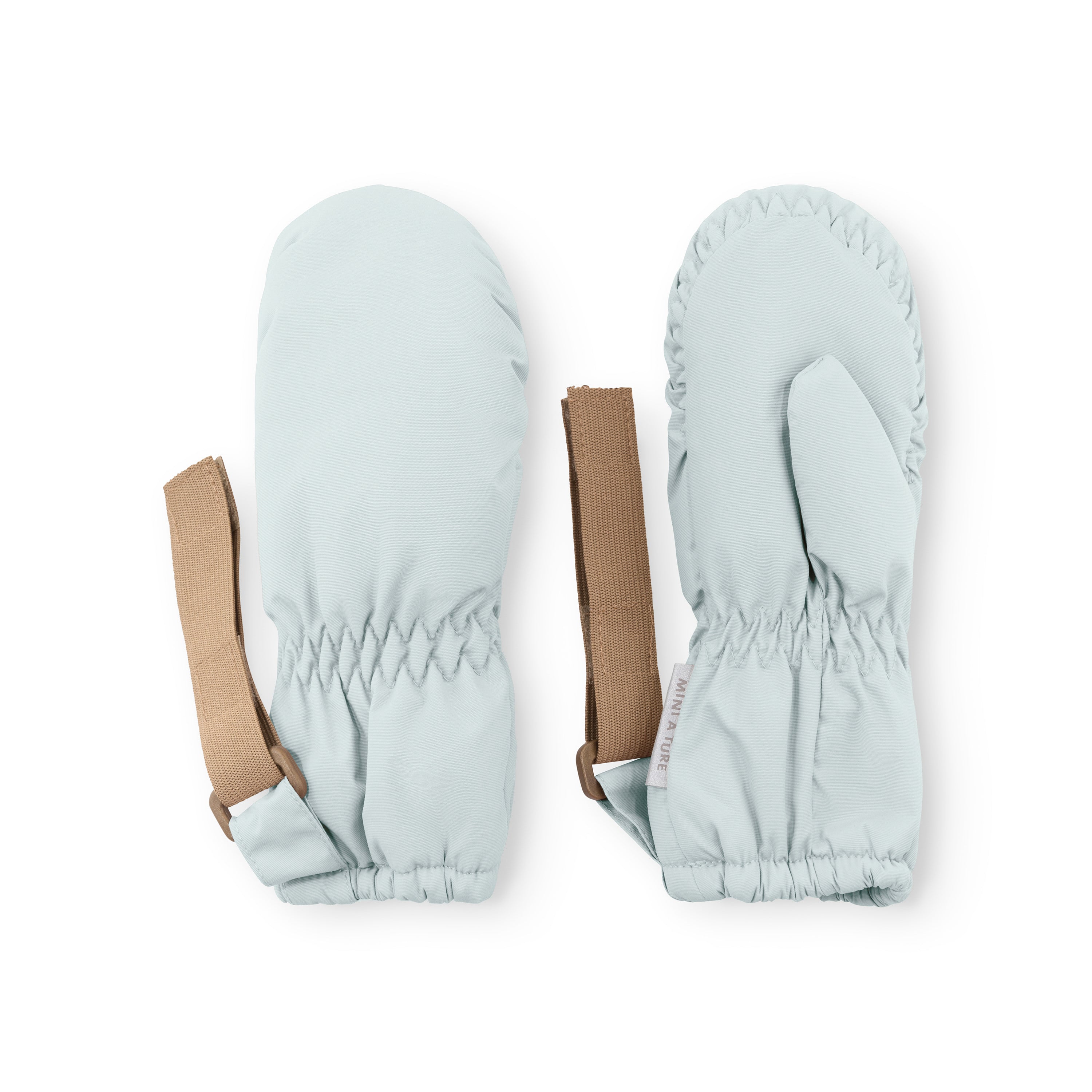MATCORDT fleece lined mittens in pale blue displayed flat on a white background, showing both front and back with elastic gathered cuffs, beige velcro attachment straps and the waterproof recycled polyamide outer shell.