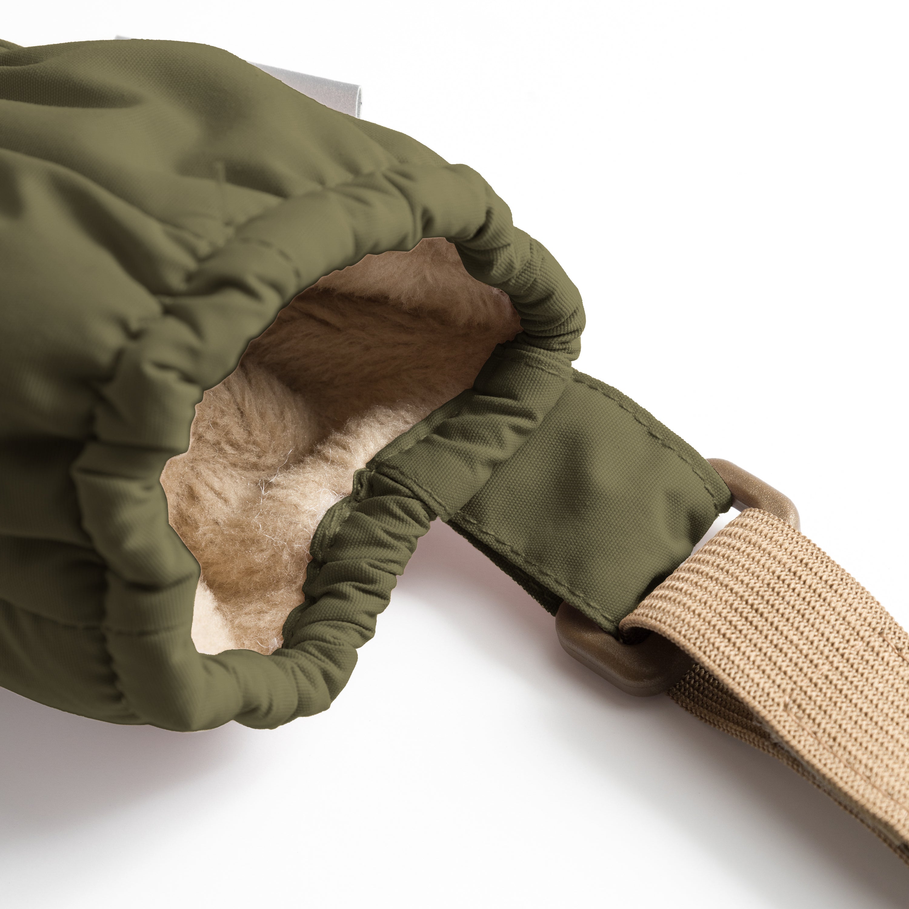 MATCORDT fleece lined mittens in olive green shown from the interior, revealing the soft beige fleece lining, elastic gathered wrist that seals out cold air and the THINSULATE padded construction designed to keep hands warm without bulk.