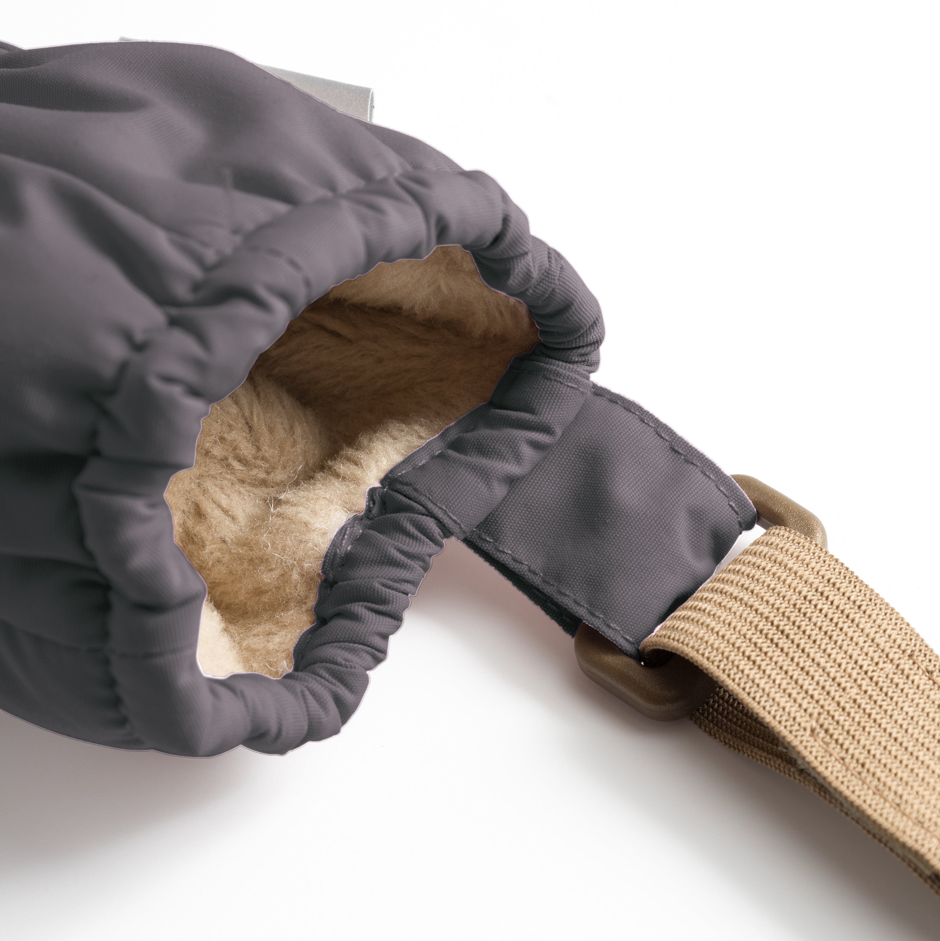 MATCORDT fleece lined mittens in grey shown from the interior, displaying the soft beige fleece lining that sits comfortably against skin, the elastic gathered wrist opening and the beige velcro attachment strap designed to secure to D-loops on MINI A TURE outerwear.