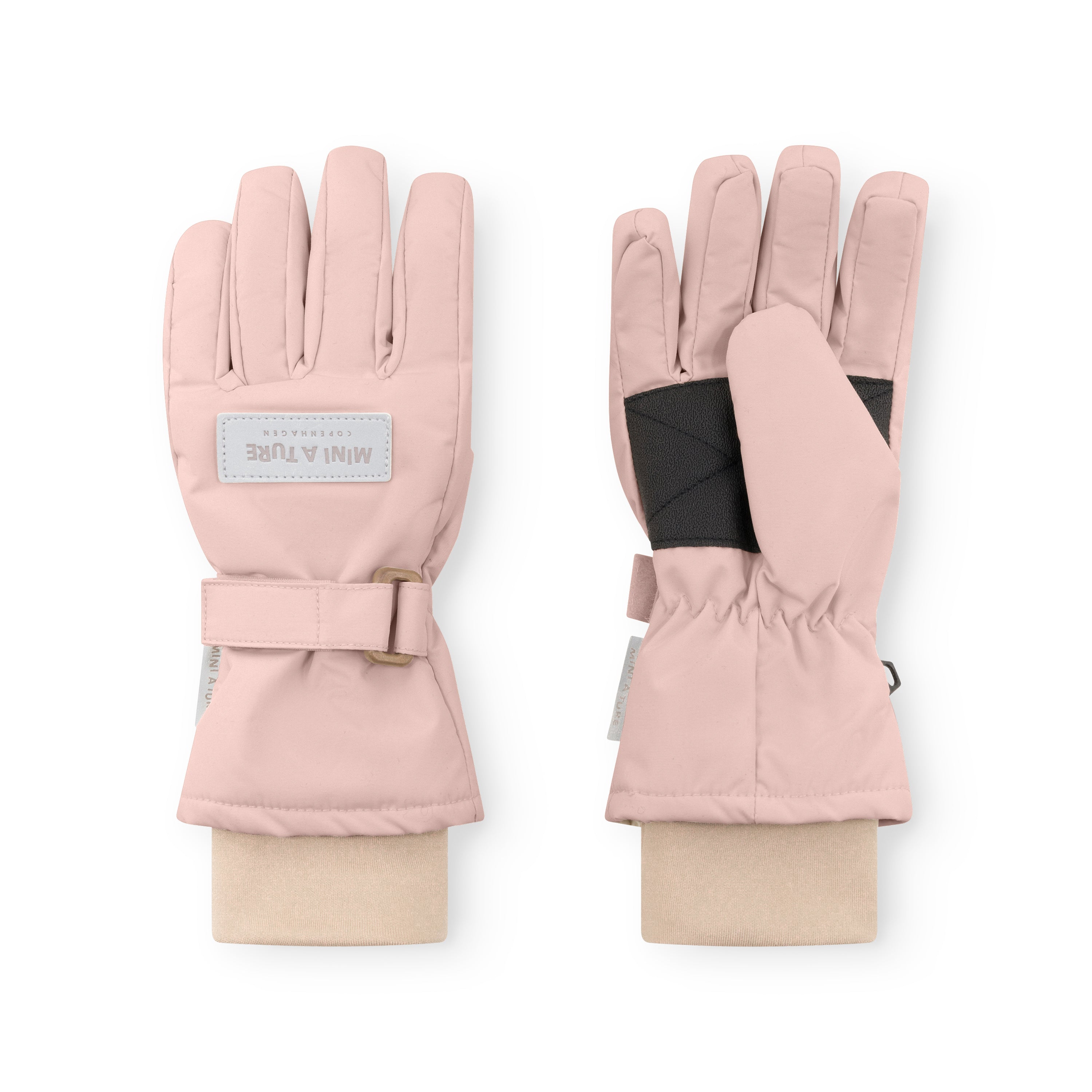 MATCELIO gloves in soft pink showing both palm and back views, with MINI A TURE Copenhagen label on the back, elasticated cuff at wrist and extended cuff length covering the forearm.