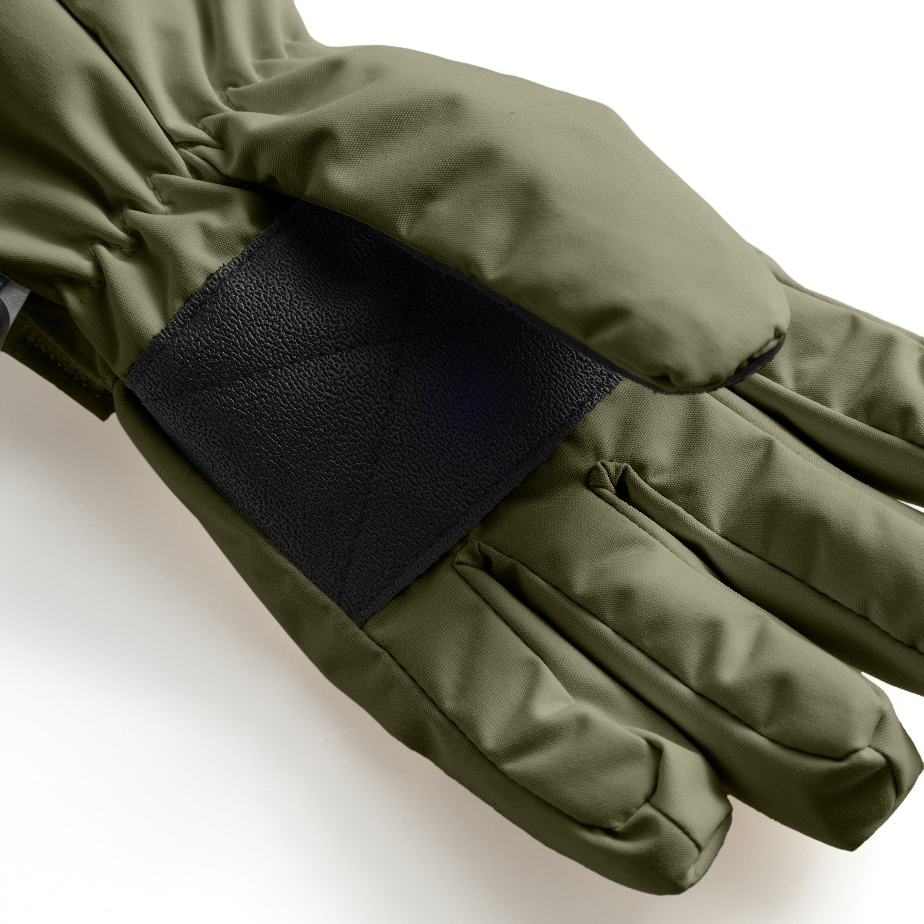 MATCELIO gloves in olive green photographed in close-up to show the black elasticated wrist cuff positioned inside the extended olive cuff, demonstrating the dual-layer construction that seals out cold air and snow during winter wear.