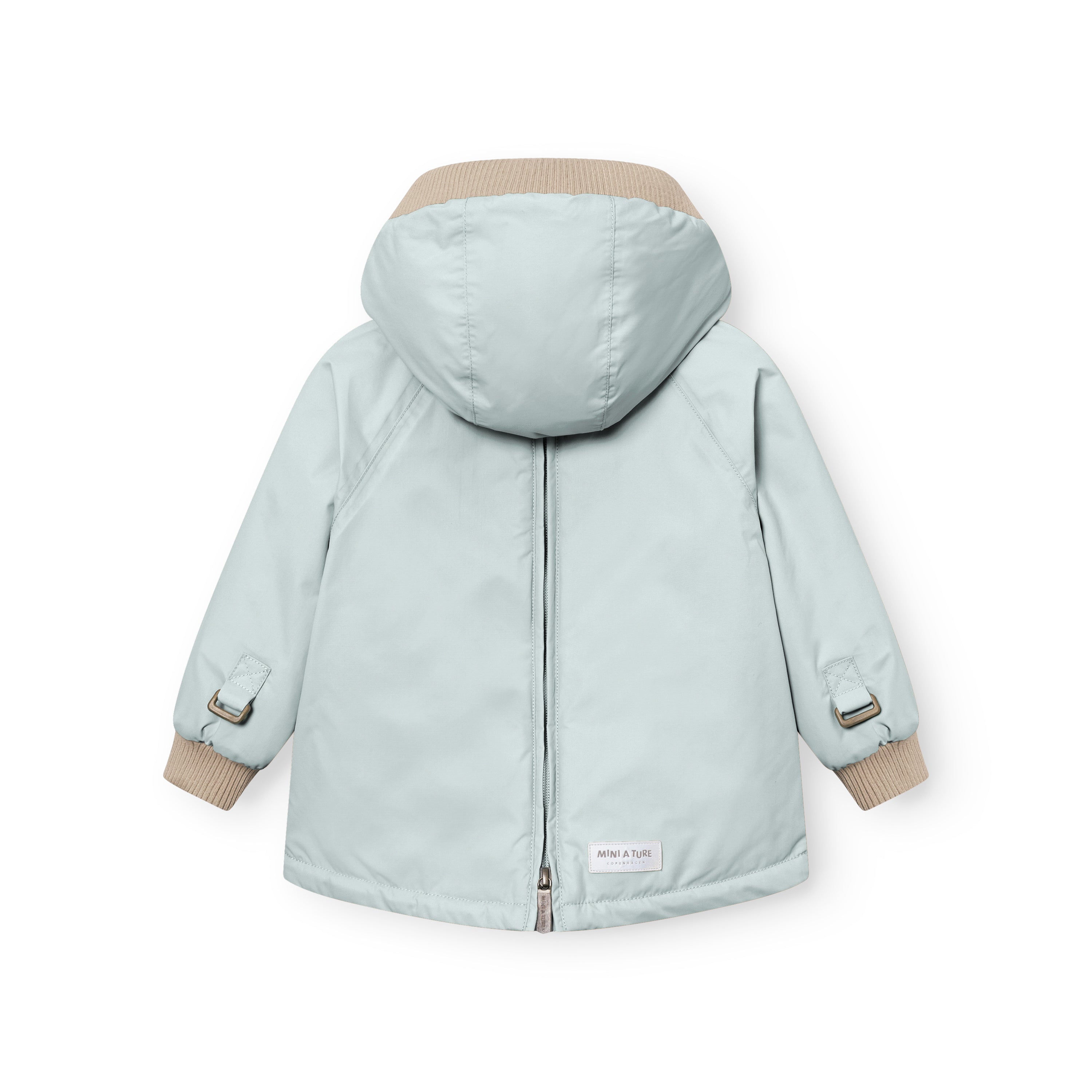 MATBABYWEN anorak in pale blue-grey shown from the back with the full-length zip fully closed, displaying the beige ribbed hood and cuffs, raglan sleeve construction with adjustable sleeve tabs, and a white MINI A TURE label at the lower back hem.