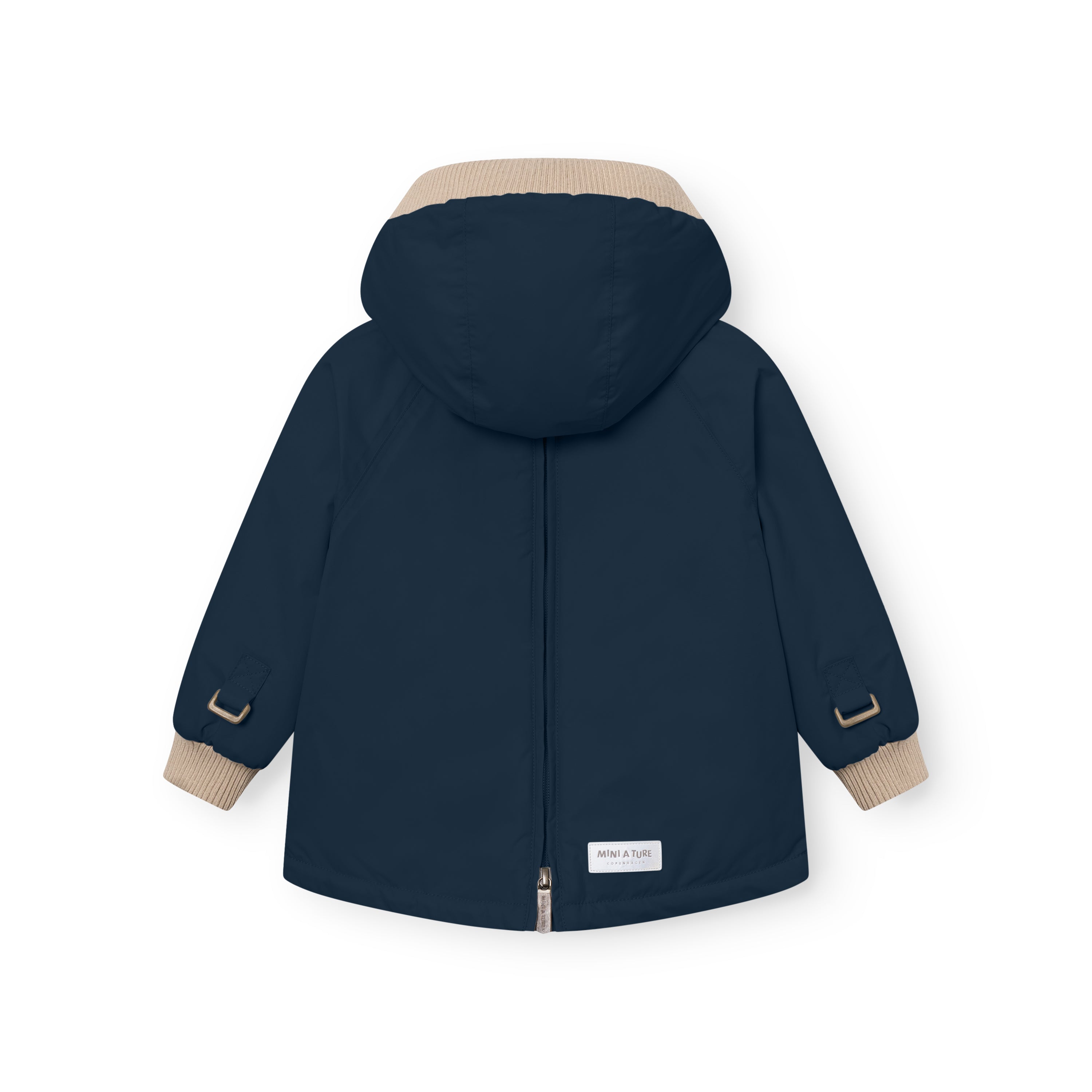 MATBABYWEN anorak in navy blue shown from the back with the full-length zip fully closed, displaying the beige ribbed hood and cuffs, raglan sleeves with adjustable tabs at the wrists, and a white MINI A TURE label at the lower back hem.