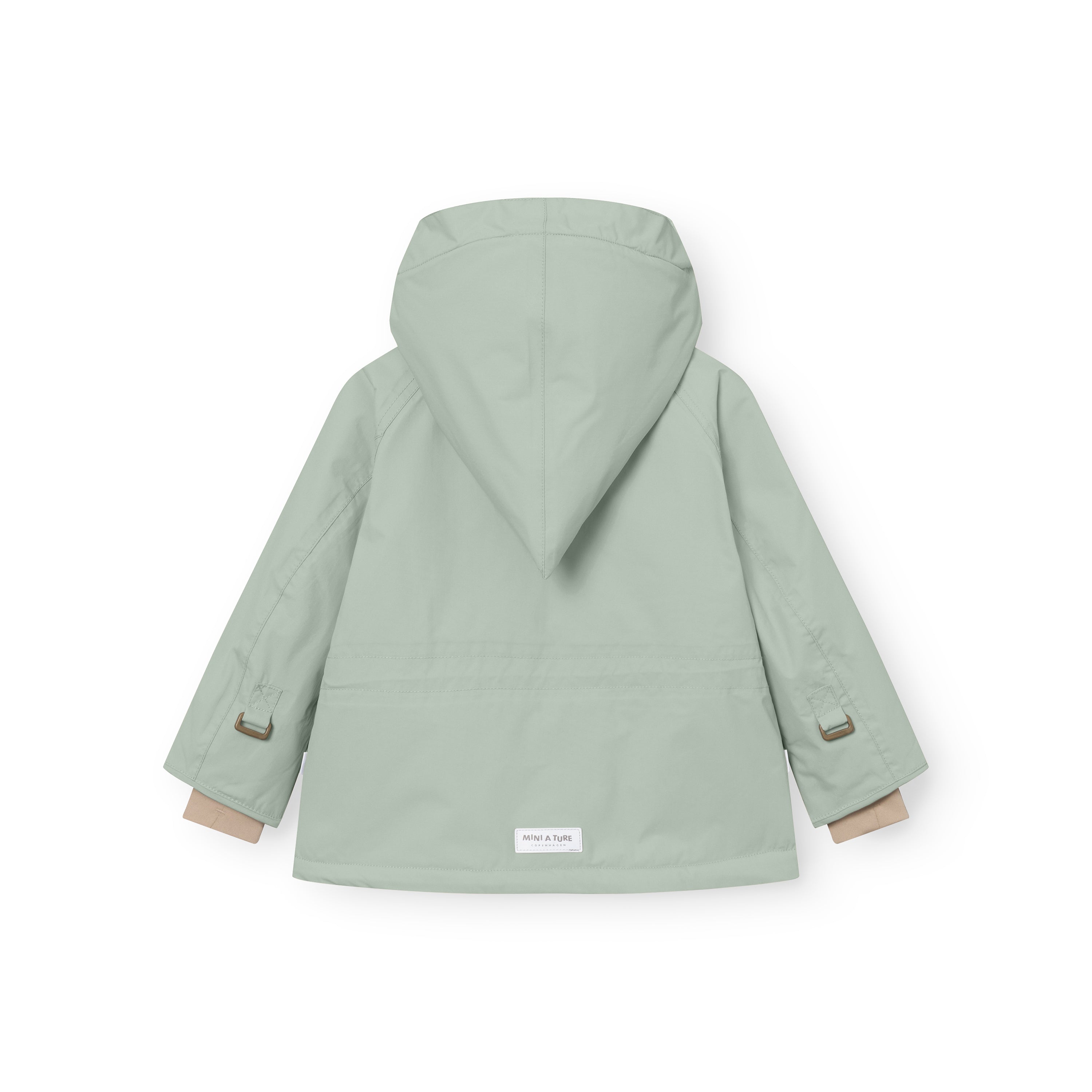 MATWANG fleece-lined winter jacket in soft sage green shown from the back with the detachable pointed hood attached, bronze D-ring buckle fastenings visible at both cuffs, white MINI A TURE label at the hem, and beige fleece lining showing at the sleeve openings.