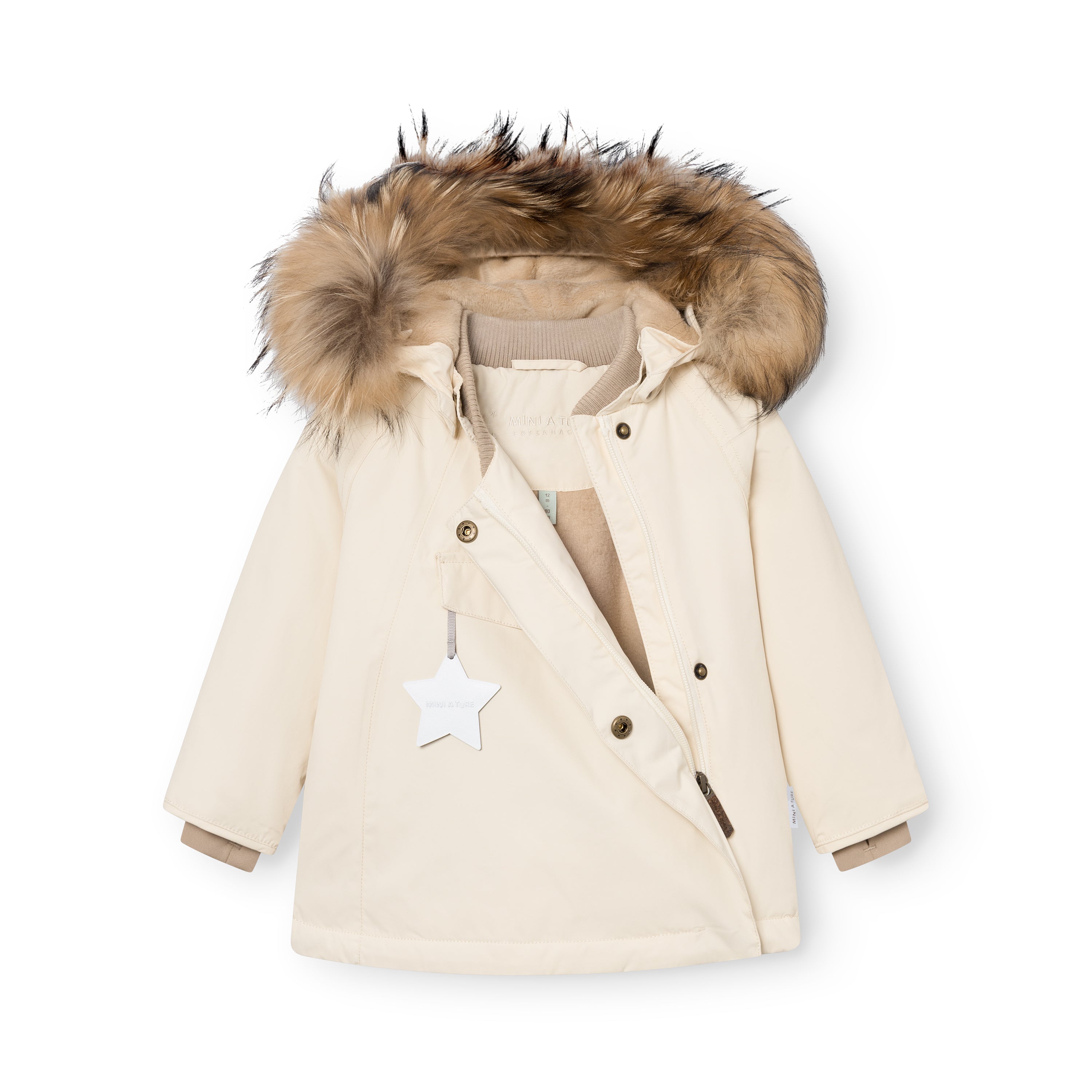MATWANG fleece lined winter jacket in cream with the hood positioned to display the detachable real fur trim, press-stud placket partially unfastened to show the hidden slanted zip and beige fleece lining, white reflective star zip pull on the chest pocket, and beige ribbed collar and cuff lining visible.