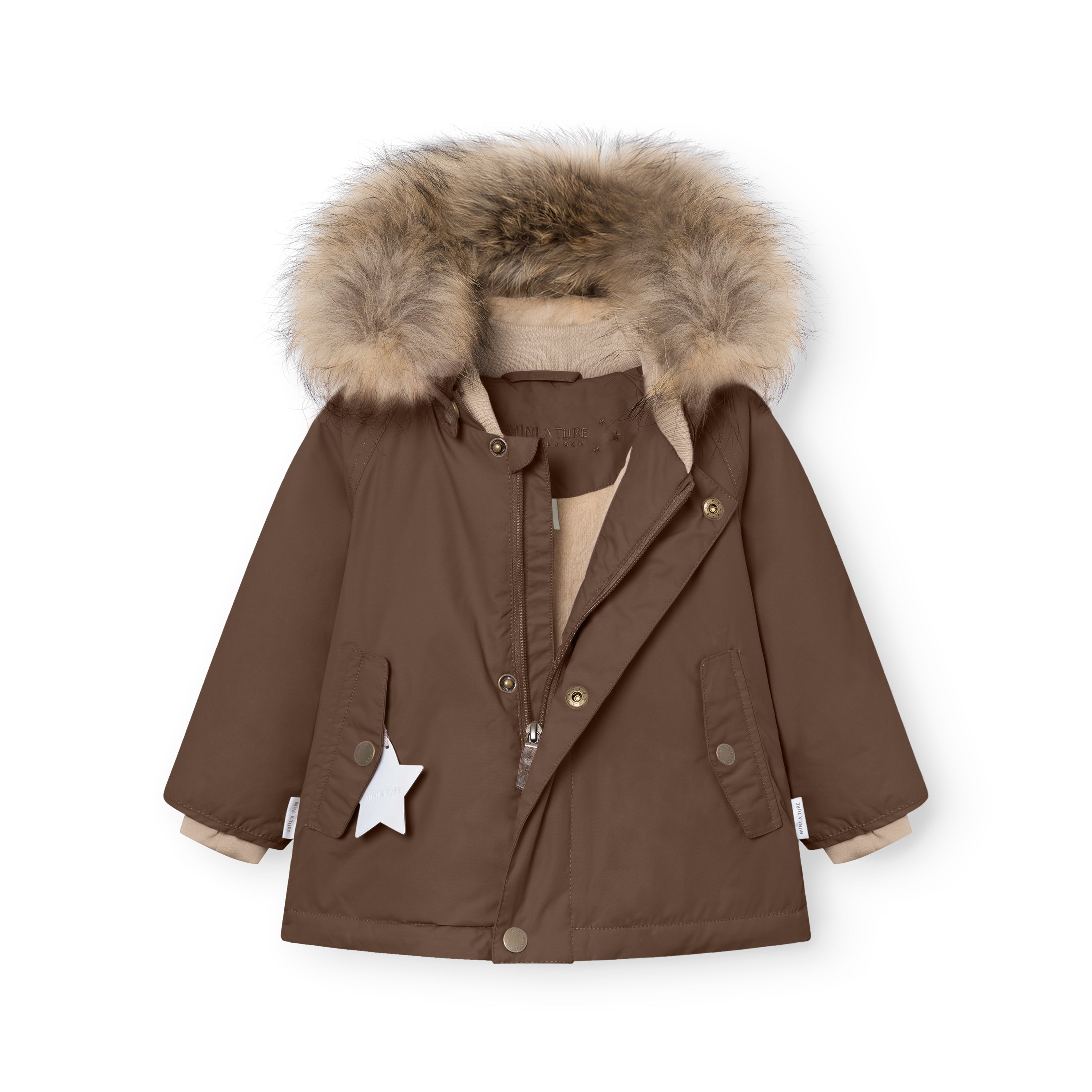 MATWALLY fleece lined winter jacket in deep brown with the hidden centre-front zip fully open, showing the soft beige fleece lining, ribbed collar, press-stud closure system, angled front pockets with flap closures, and a white reflective star charm hanging from the left pocket, with the detachable real fur hood trim displayed at the top.