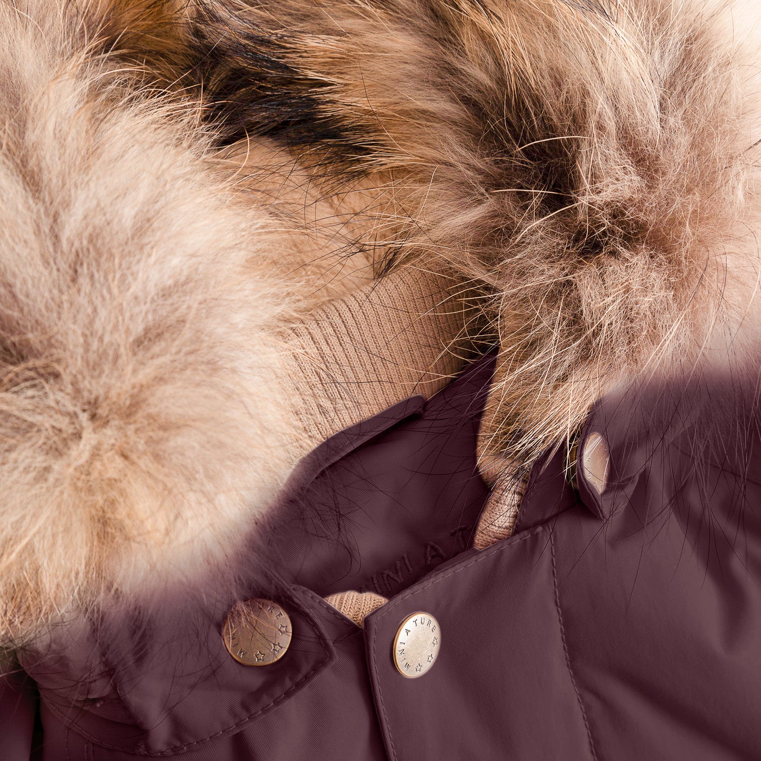 Close-up detail of the MATWALLY fleece lined winter jacket's detachable real fur hood trim and press-stud fastening system, showing the luxurious texture of the natural fur and the branded metal closure hardware.
