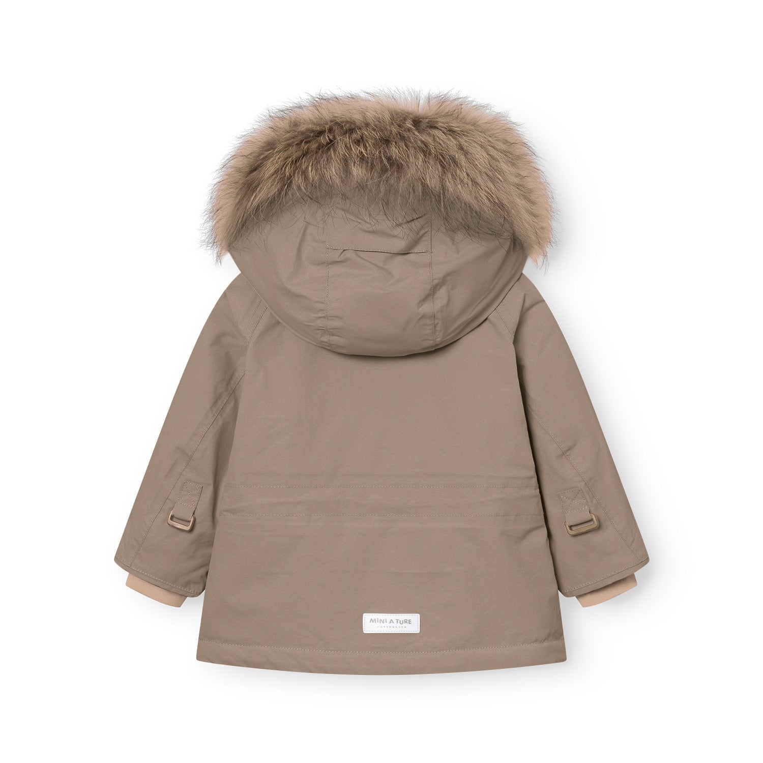 Rear view of the MATWALLY fleece lined winter jacket in warm taupe, displaying the detachable real fur hood trim in natural tones with soft, layered texture, shaped sleeves with adjustable tabs and metal hardware, branded MINI A TURE label at the hem, and beige fleece lining visible at the cuffs.