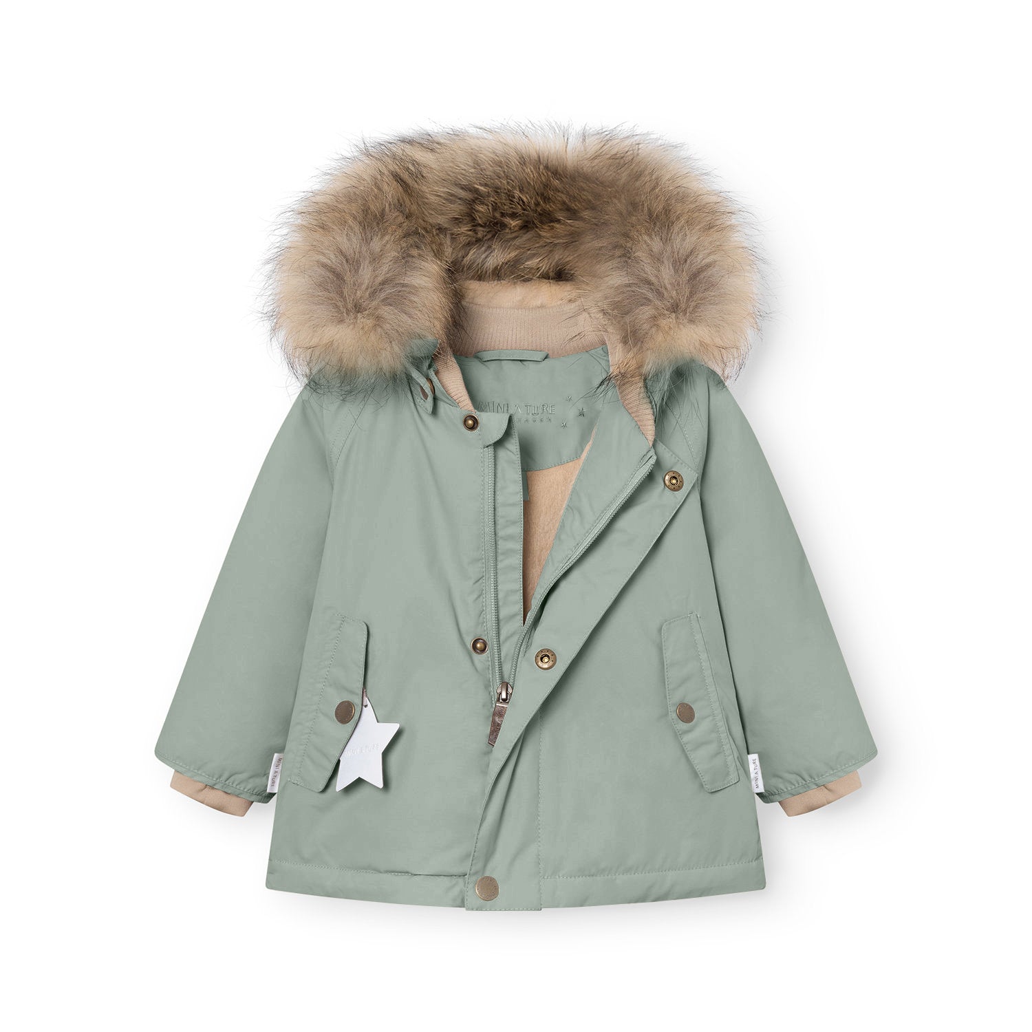 MATWALLY fleece lined winter jacket in muted sage green with the hidden centre-front zip partially open, exposing the beige fleece lining and ribbed collar, with press-stud front closure, angled front pockets, a white reflective star charm hanging from the left pocket, and the detachable real fur hood trim in natural tones framing the collar.