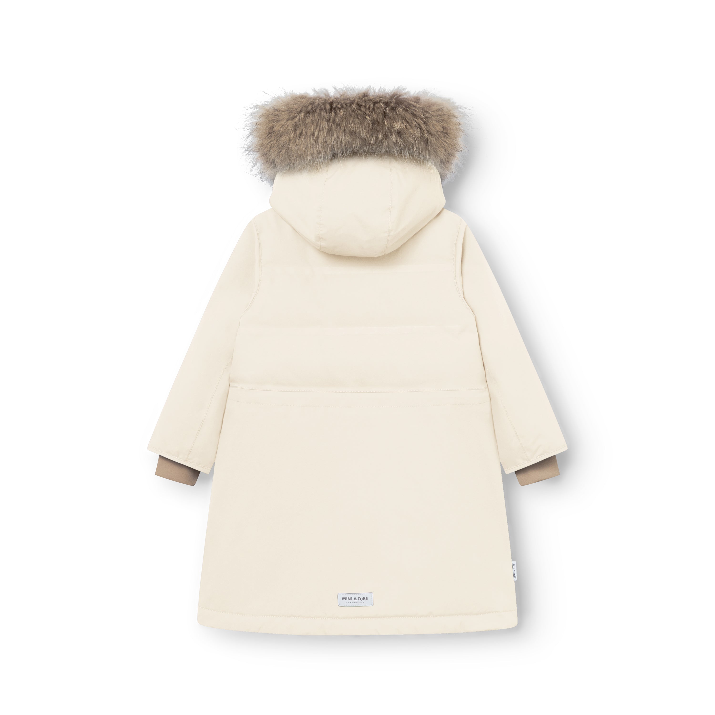 MATVENCASIA winter jacket in cream shown from the back, highlighting the mid-thigh length, smooth recycled polyamide shell, detachable hood with genuine fur trim, and the MINI A TURE label at the hem.