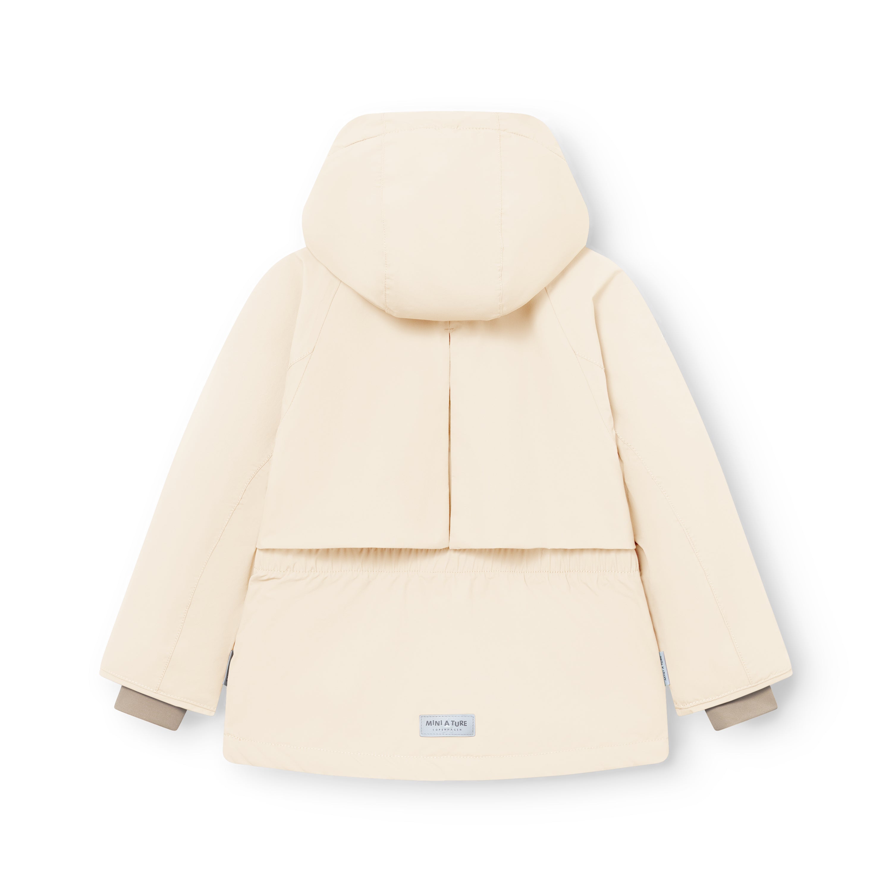 MATALGEANA winter jacket in cream laid flat from the back, showing the detachable hood with snap button fastenings, centre back vent, elasticated waist panel, cape shoulder overlay, beige fleece-lined cuffs, and MINI A TURE woven label at the hem on the waterproof recycled polyamide shell.