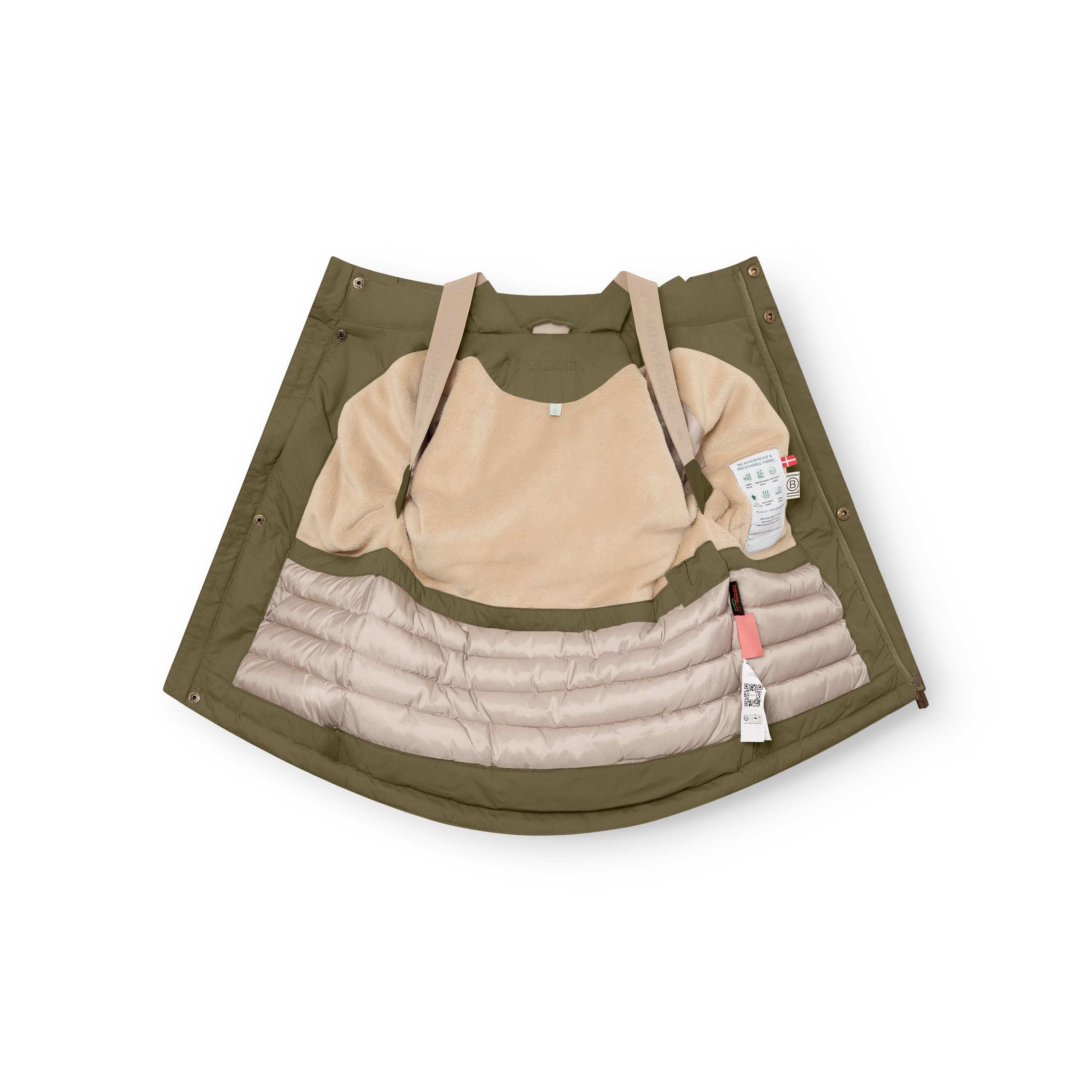 MATKASTORIO fleece lined winter jacket laid flat and opened to display internal construction, showing beige fleece lining in the upper body, cream Sorona Aura padded lower section, adjustable internal suspenders across the shoulders, and care label visible inside.