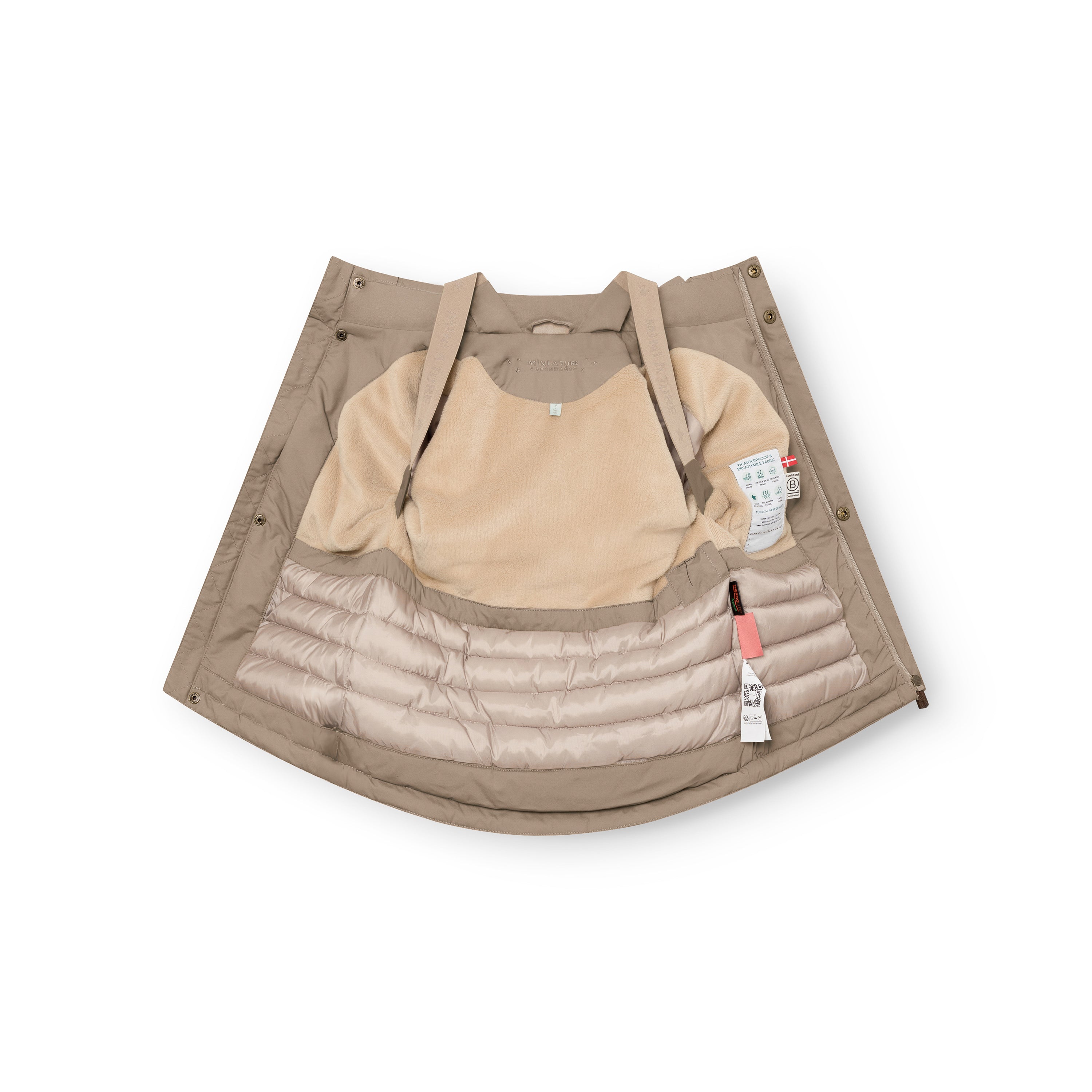 Taupe MATKASTORIO fleece lined winter jacket spread fully open to display the beige fleece-lined upper interior, beige adjustable suspenders, cream Sorona Aura padded lower section with horizontal quilting, snap-button placket along the front edges, and product care labels visible on the inner right side.
