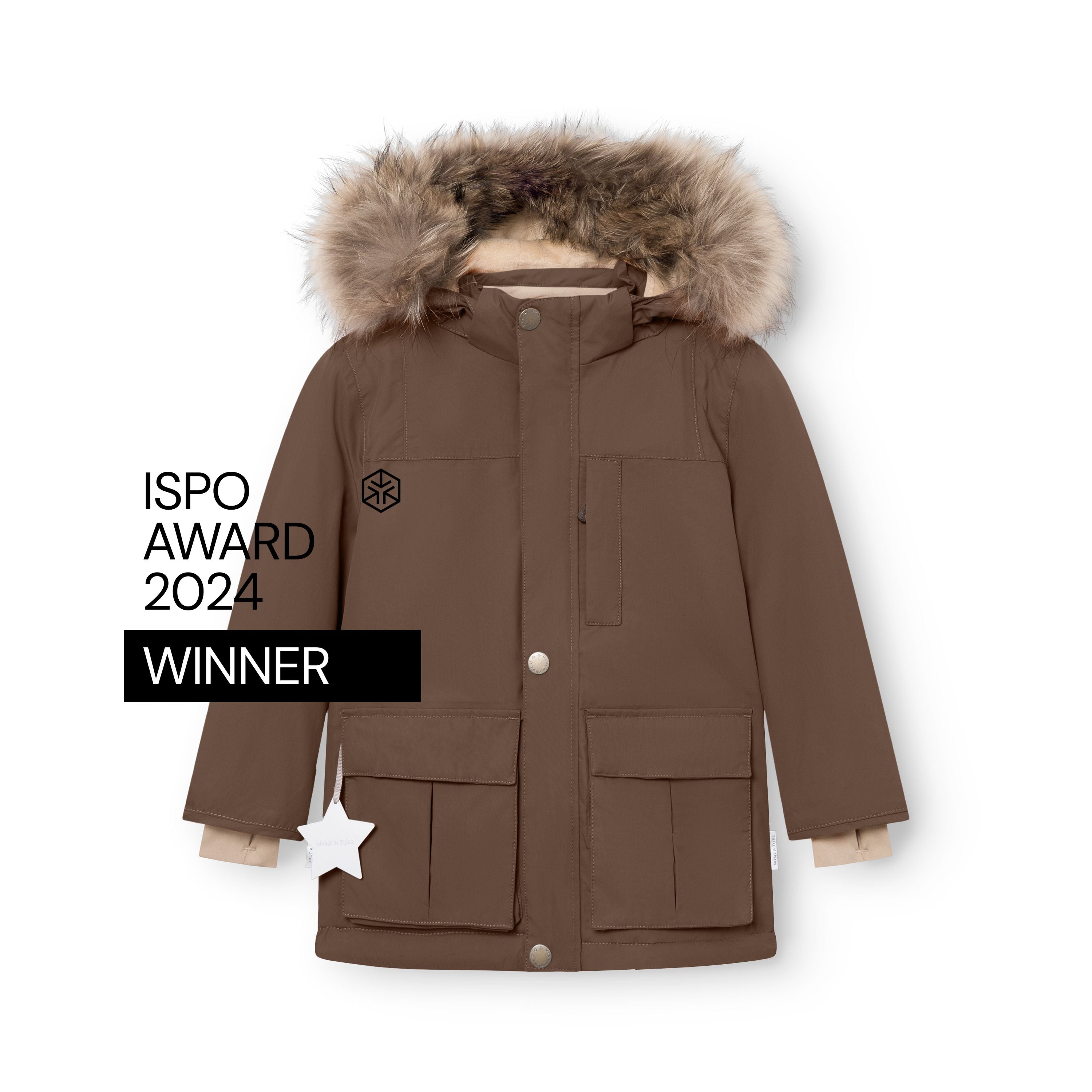 MATKASTORIO fleece lined winter jacket in warm brown, front view with hood up and genuine fur trim, snap button and zip closure, two large utility pockets with flap covers, white reflective star charm on the left pocket and ISPO Award 2024 Winner badge on the left chest.