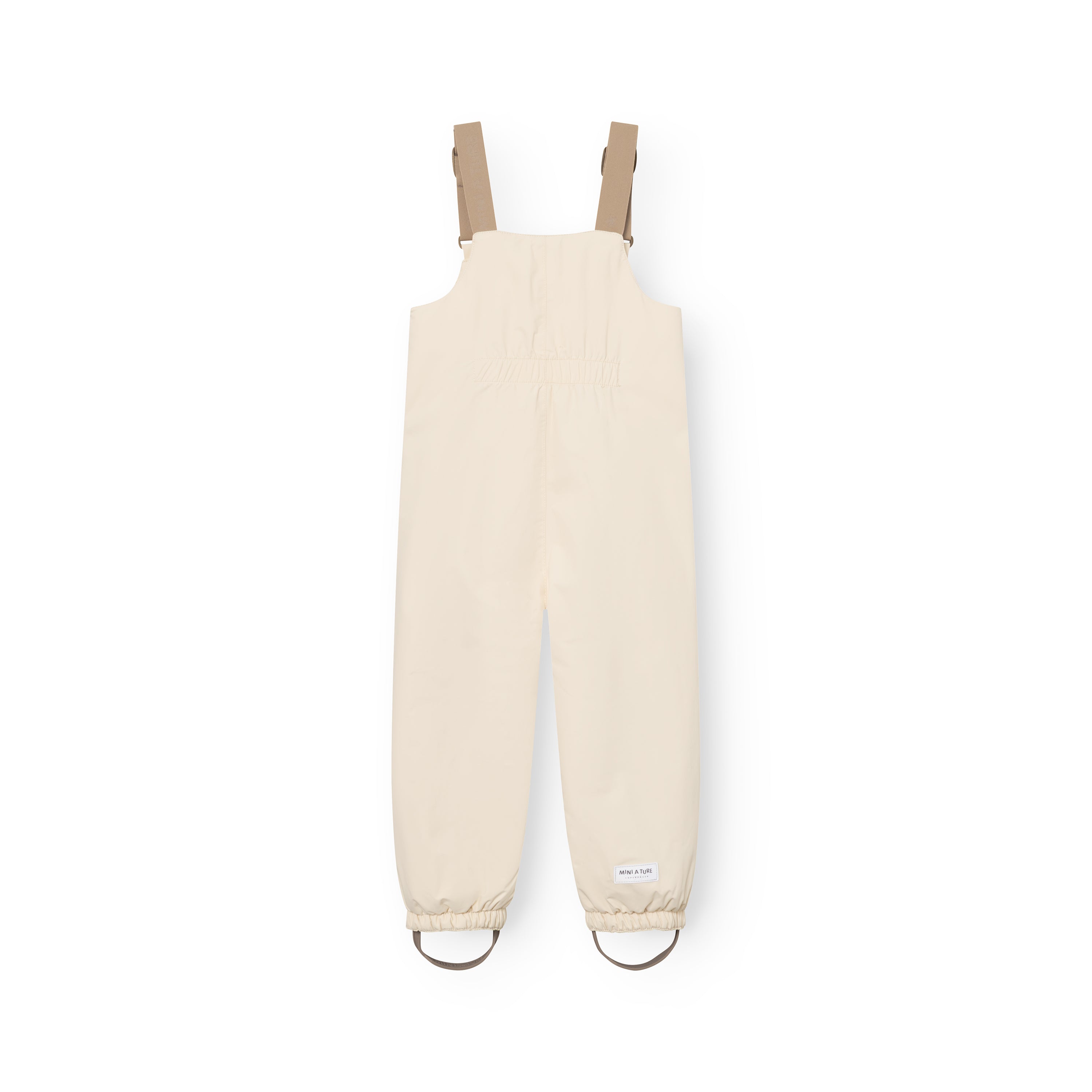 MATWALENTEX snow pants in cream viewed from the rear, displaying the elasticated waistband, beige adjustable suspenders, dropped crotch construction, elasticated ankle cuffs and brown foot straps on a white background.