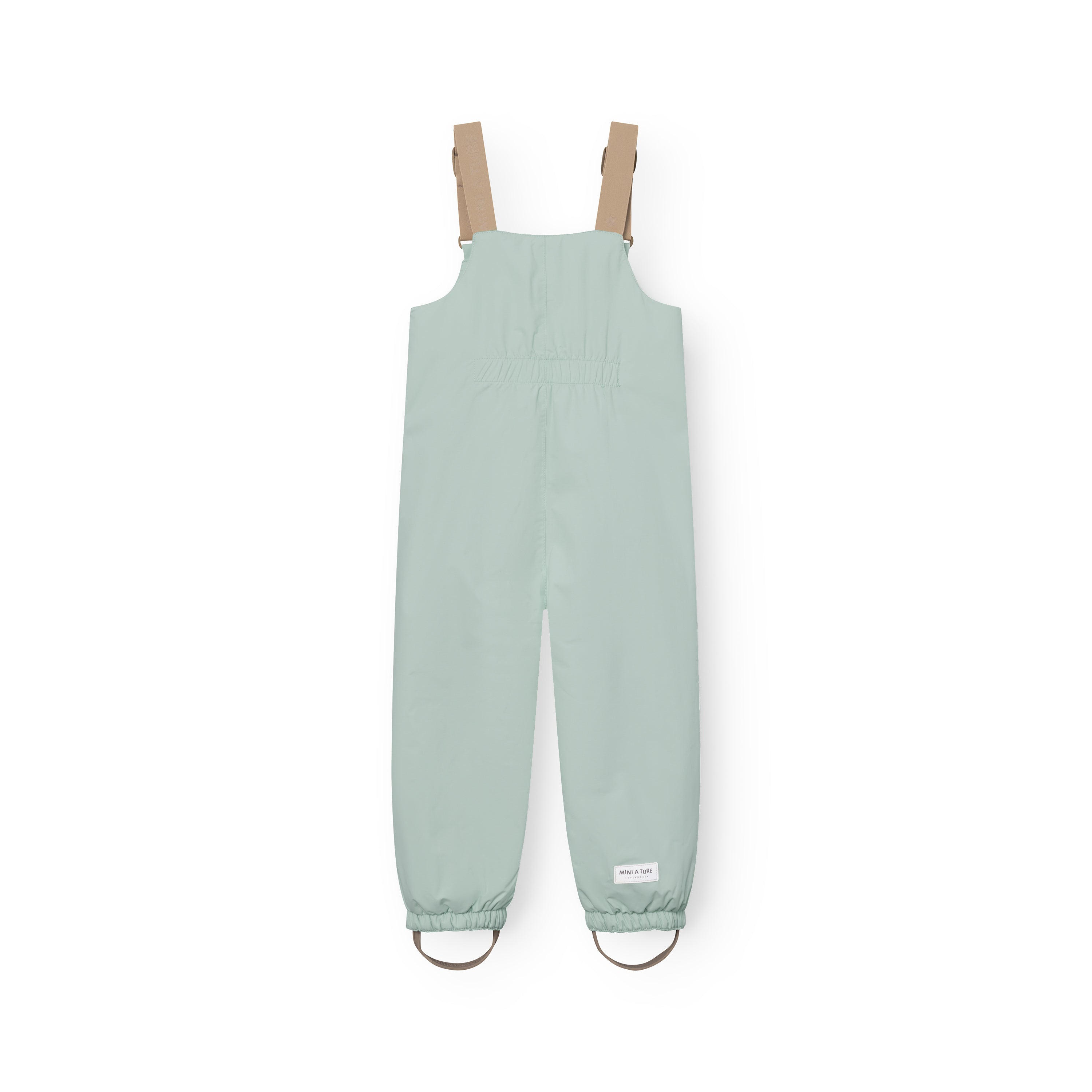 MATWALENTEX snow pants in pale mint green viewed from the rear, showing the elasticated waistband, beige adjustable suspenders, dropped crotch design, elasticated ankle cuffs and grey foot straps on a white background.