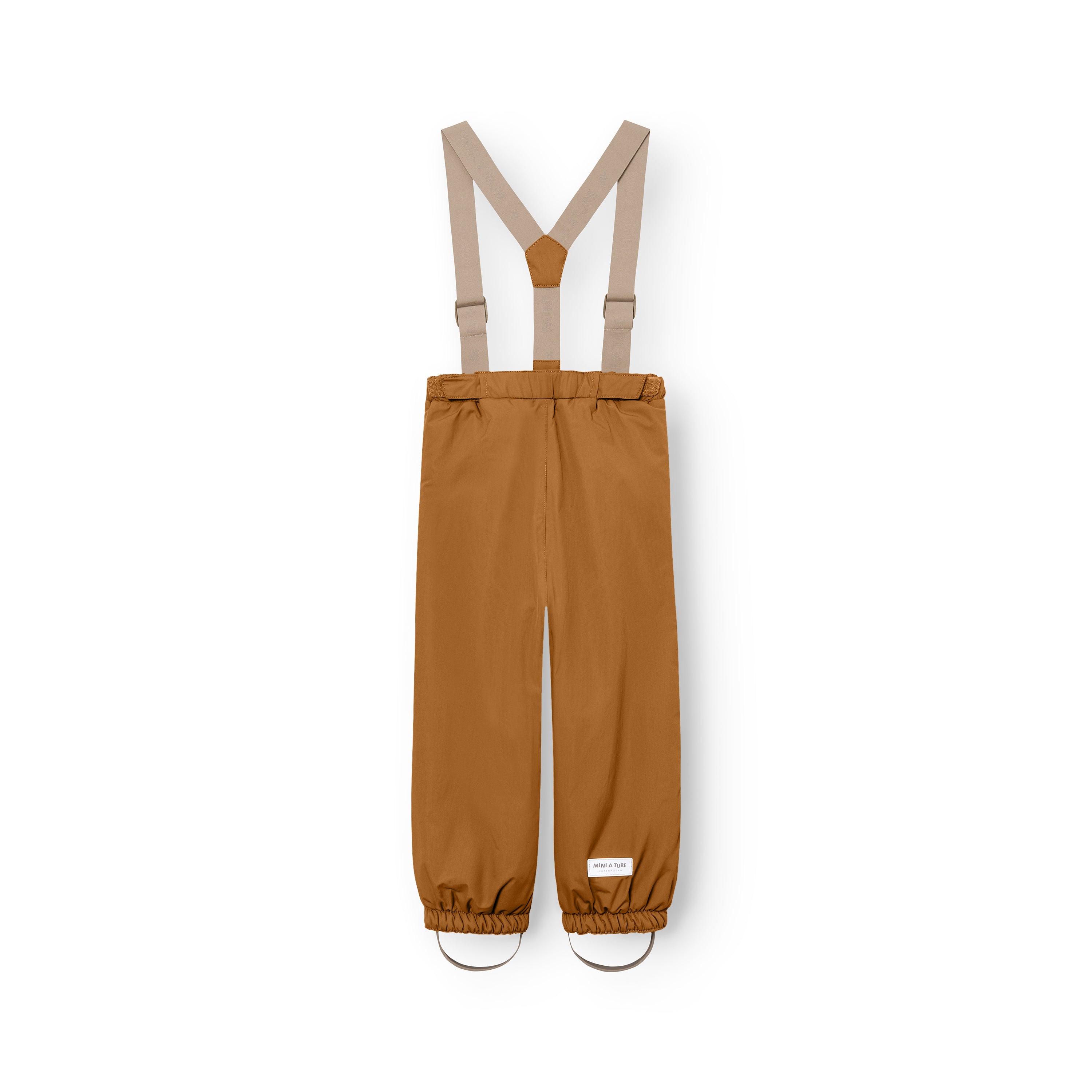 MATWILAS snow pants in warm caramel with beige adjustable braces, elasticated waistband and ankle cuffs with removable foot straps, displayed flat on a white background.