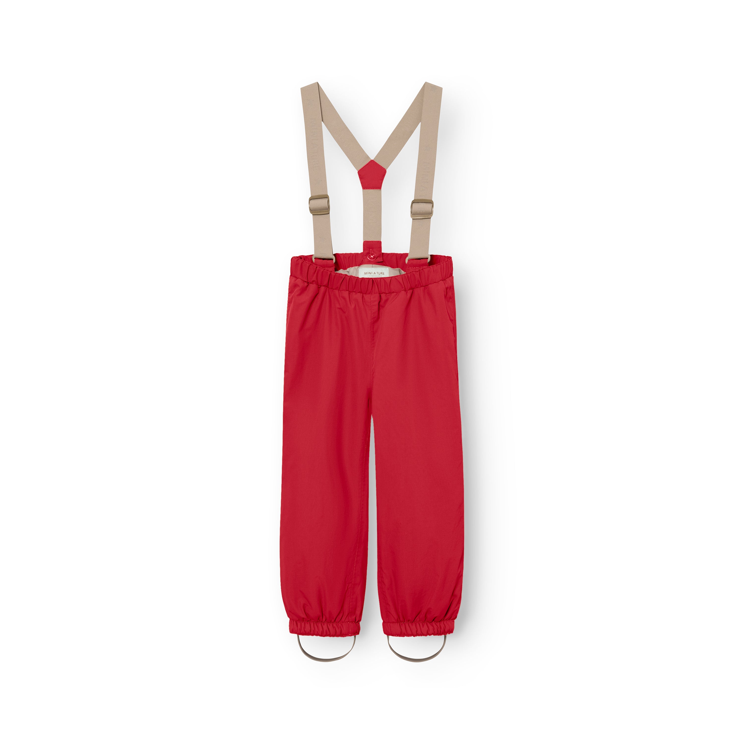 MATWILAS snow pants in vibrant red with beige detachable cross-back braces, elasticated waistband and ankle cuffs with removable foot straps, shown flat against a white background.