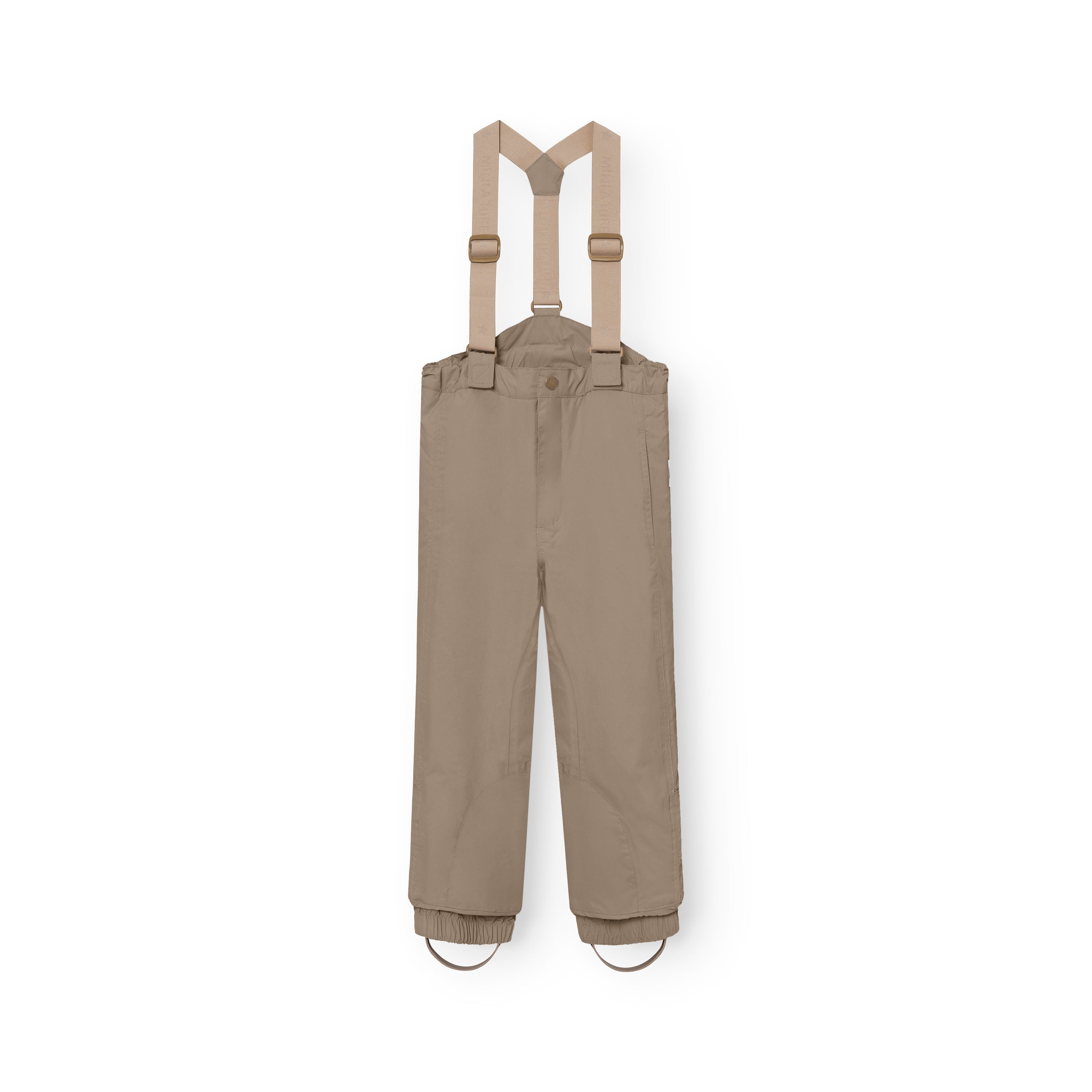 MATWITTE snow pants in warm beige with removable elastic suspenders, snap-button waist fastening and elasticated ankle cuffs with foot straps, laid flat to show the full-length waterproof shell and regular fit for skiing and winter outdoor activities.