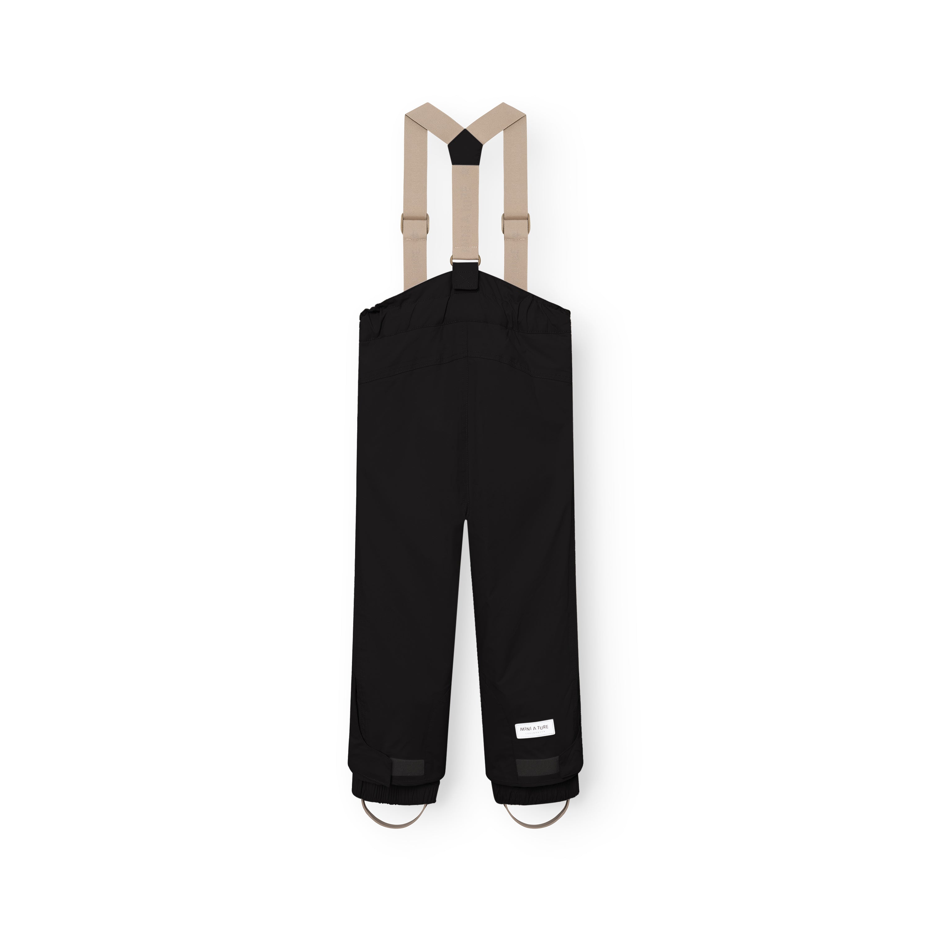 MATWITTE snow pants displayed from the back, highlighting the detachable beige suspenders with cross-back design, zip and snap-button waist closure, and elasticated ankle cuffs with integrated foot straps for secure fit during skiing and winter play.