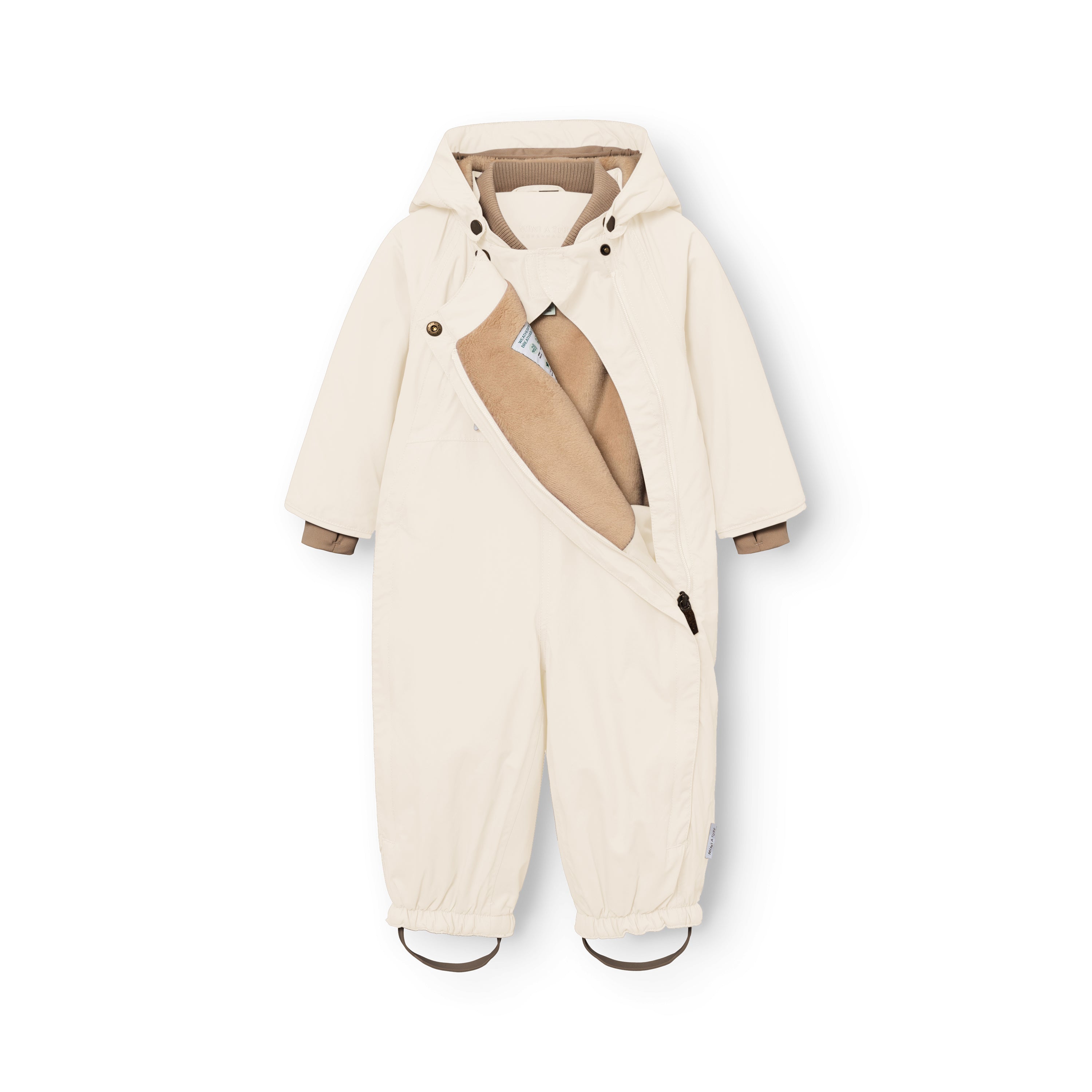 MATWISTI fleece lined snowsuit in warm beige with one of the two slanted front zips fully open, revealing the beige fleece lining and internal care label, alongside the detachable hood with snap buttons, beige ribbed cuffs and elasticated leg openings with adjustable foot straps.