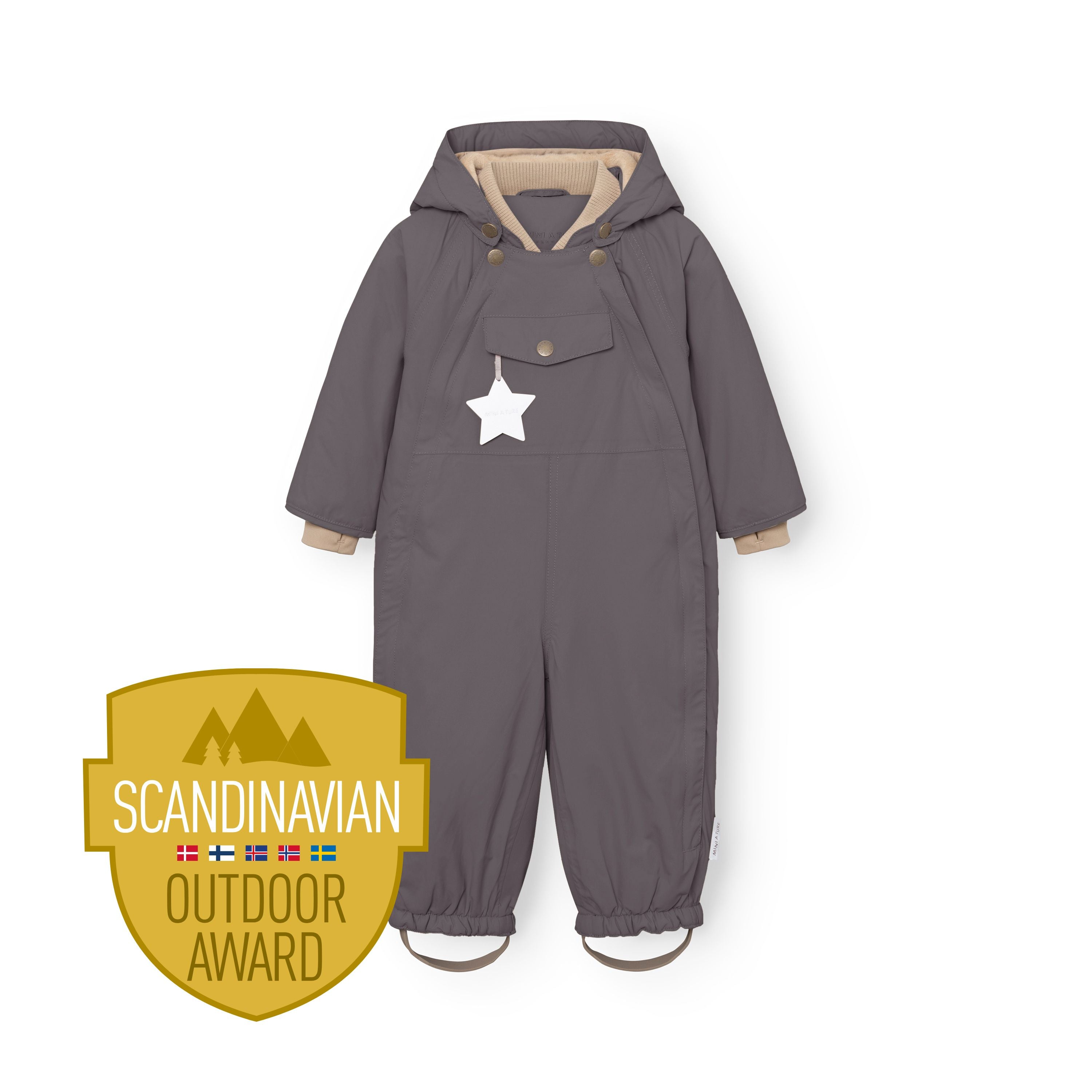 MATWISTI fleece lined snowsuit in charcoal grey shown against a white background with detachable hood fastened, front chest pocket with white reflective star, beige ribbed cuffs at the wrists and elasticated leg openings with adjustable foot straps, alongside the gold Scandinavian Outdoor Award badge at the lower left.